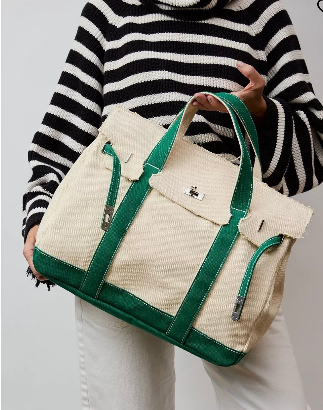 Sunwin
Madaket Large Classic Tote Bag

Effortless sophistication meets versatile style in this Sunwin Madaket large classic tote bag, featuring a turn-lock belted flap closure with silver-tone hardware for secure access. Front and back slip pockets, along with canvas lining and top handles, offer organized, easy carry

#LTKWorkwear #LTKootd #LTKTravel