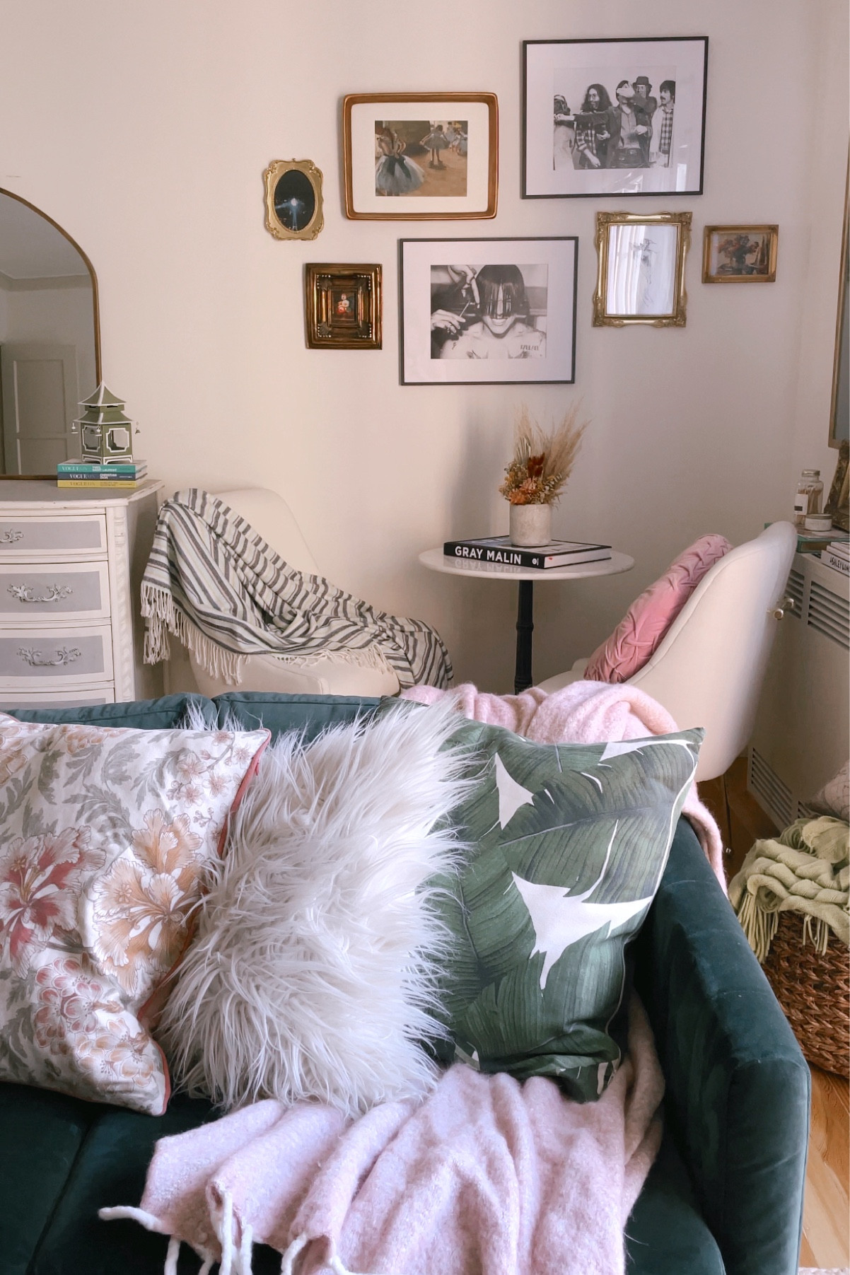 Living room home decor, wayfair green velvet couch, sofa, pink soft wool-blend throw blanket from H&M, affordable, budget friendly, under $30, Apple the Snake by Willa Heart in Gold Framed Paper, Medium Art Print, chairish, wall art, Better Homes & Gardens Feather Filled Botanical Palm Leaves Decorative Throw Pillow, Walmart, Amazon home, Faxon Oriental Pink/Beige Area Rug - on sale now, Hand Braided Jute Rug from rugs.com, home accents, Anthropologie linen white chair, palm print pillow, gold antique inspired / vintage inspired