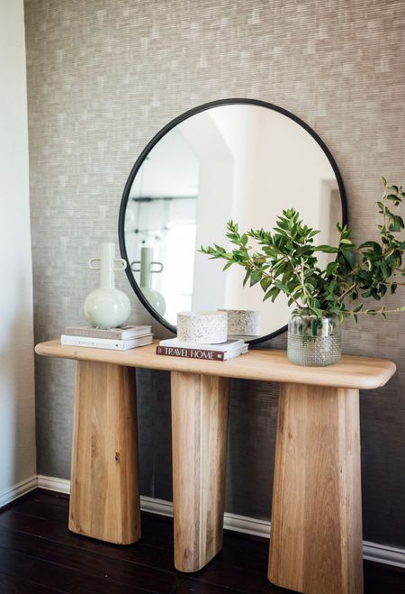 Entryway table home decor: console table, black framed round mirror, vases and pot - the vases are 50% off no code needed 

#LTKstyletip #LTKsalealert #LTKhome