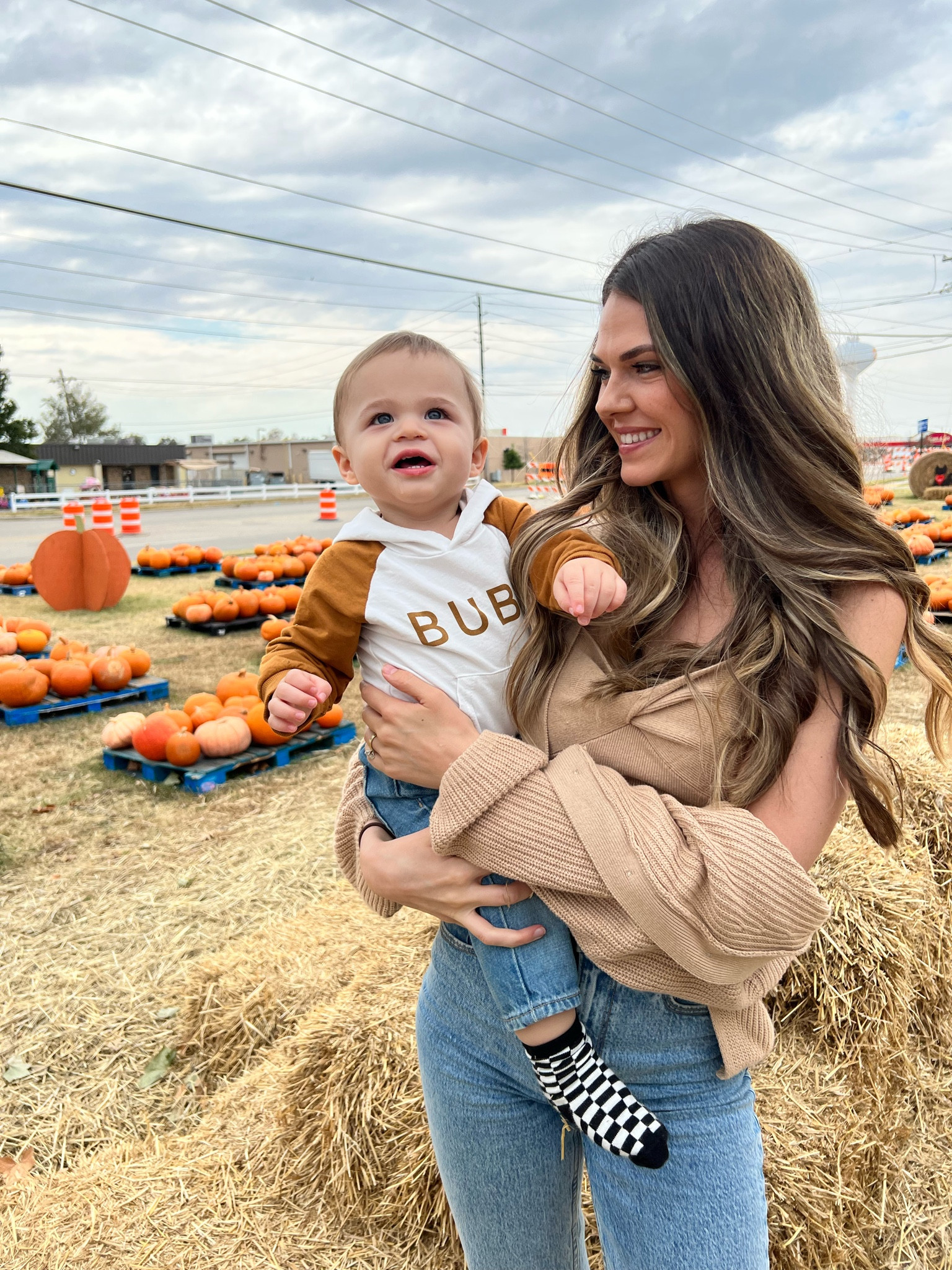 Pumpkin patch outfit 
Abercrombie jeans 
Abercrombie cardigan & twist tank 
hoop earrings 
Baby socks 

#LTKbaby #LTKSeasonal #LTKfamily