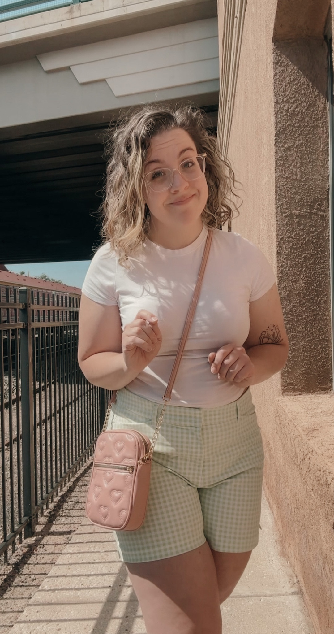 Summer crop top and shorts outfit with pink heart purse

#LTKstyletip #LTKcurves #LTKbeauty