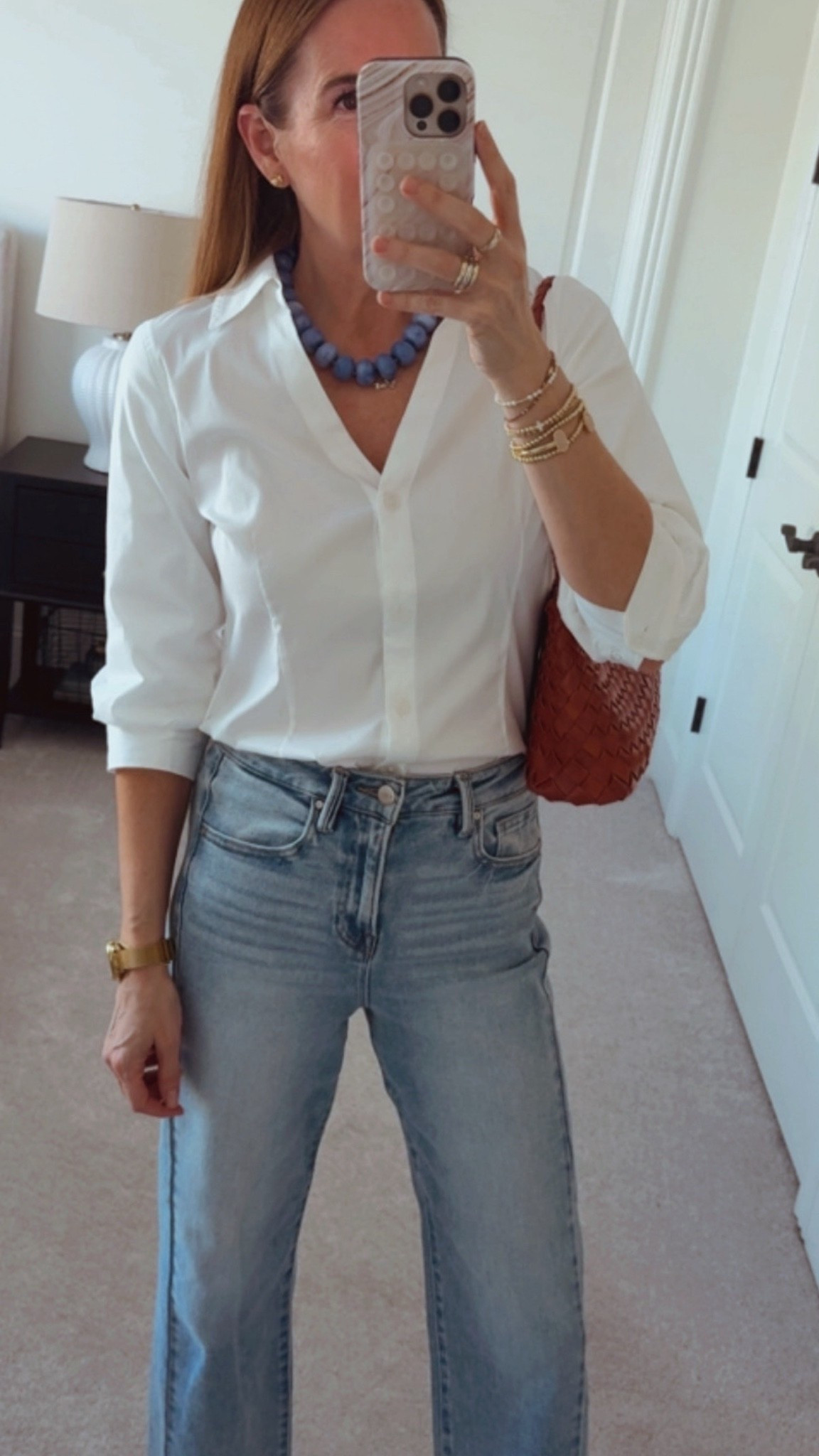 All time favorite white button down. Feminine cut and really soft. Love this fun necklace, too.

#LTKSaleAlert