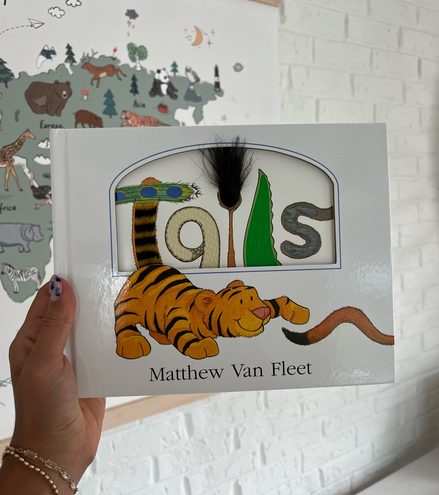 interactive animal book about tails! So many textures and flaps to open-book is sturdy as well!

#LTKKids #LTKFamily #LTKBaby