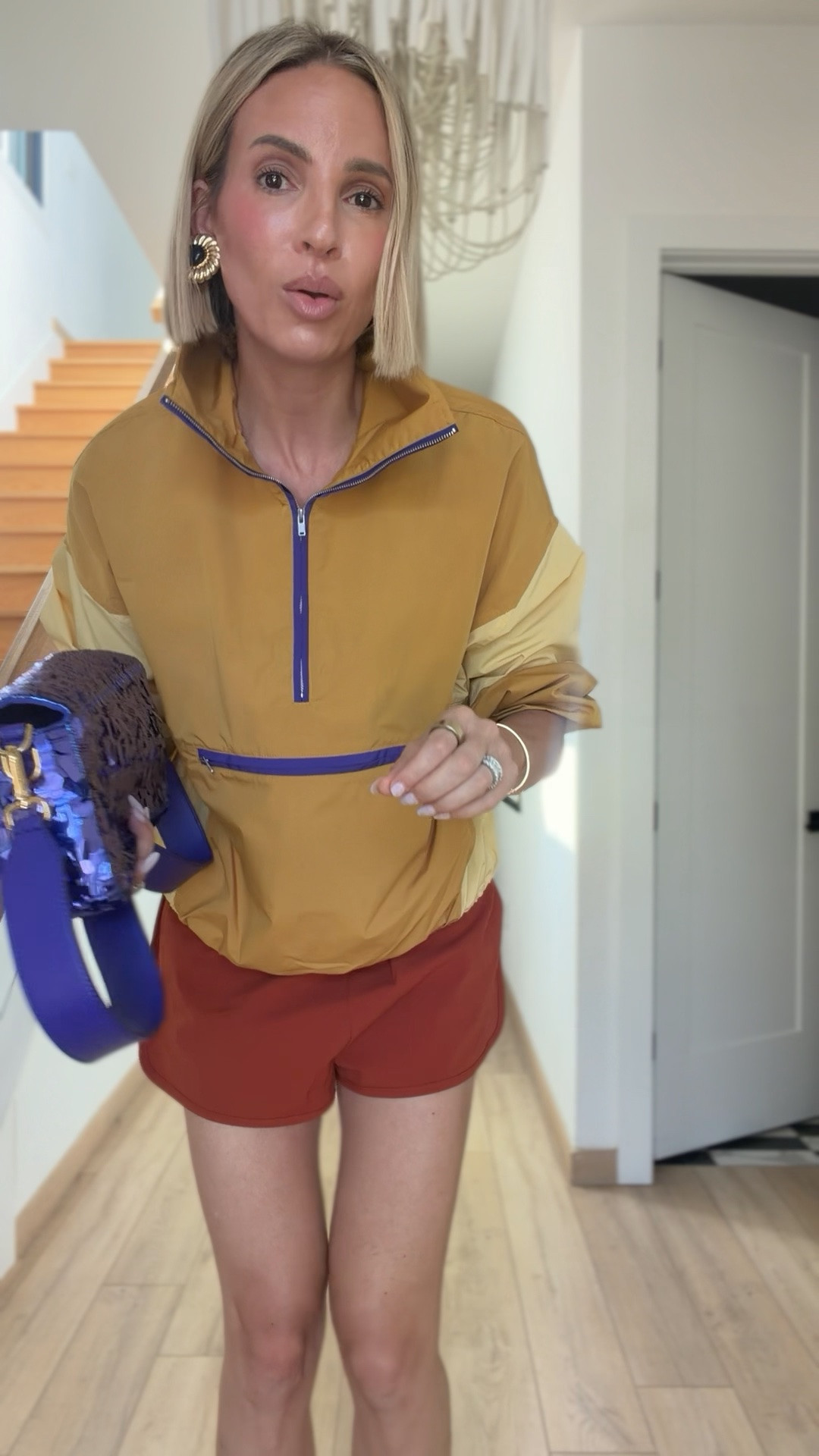 We’re in a medium in the windbreaker and a small in the shorts. I ordered my usual size in the shoes.

#LTKootd #LTKdayinmylife #LTKOver40
