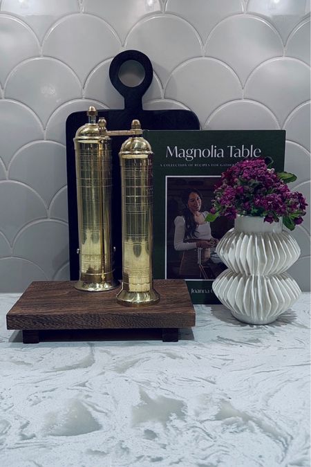 ☺️ A simple way to style your kitchen counter with a cookbook, cutting board, small white vase, wooden tray, and salt and pepper mill set! 

Shop the look below! 

#LTKstyletip #LTKsalealert #LTKhome