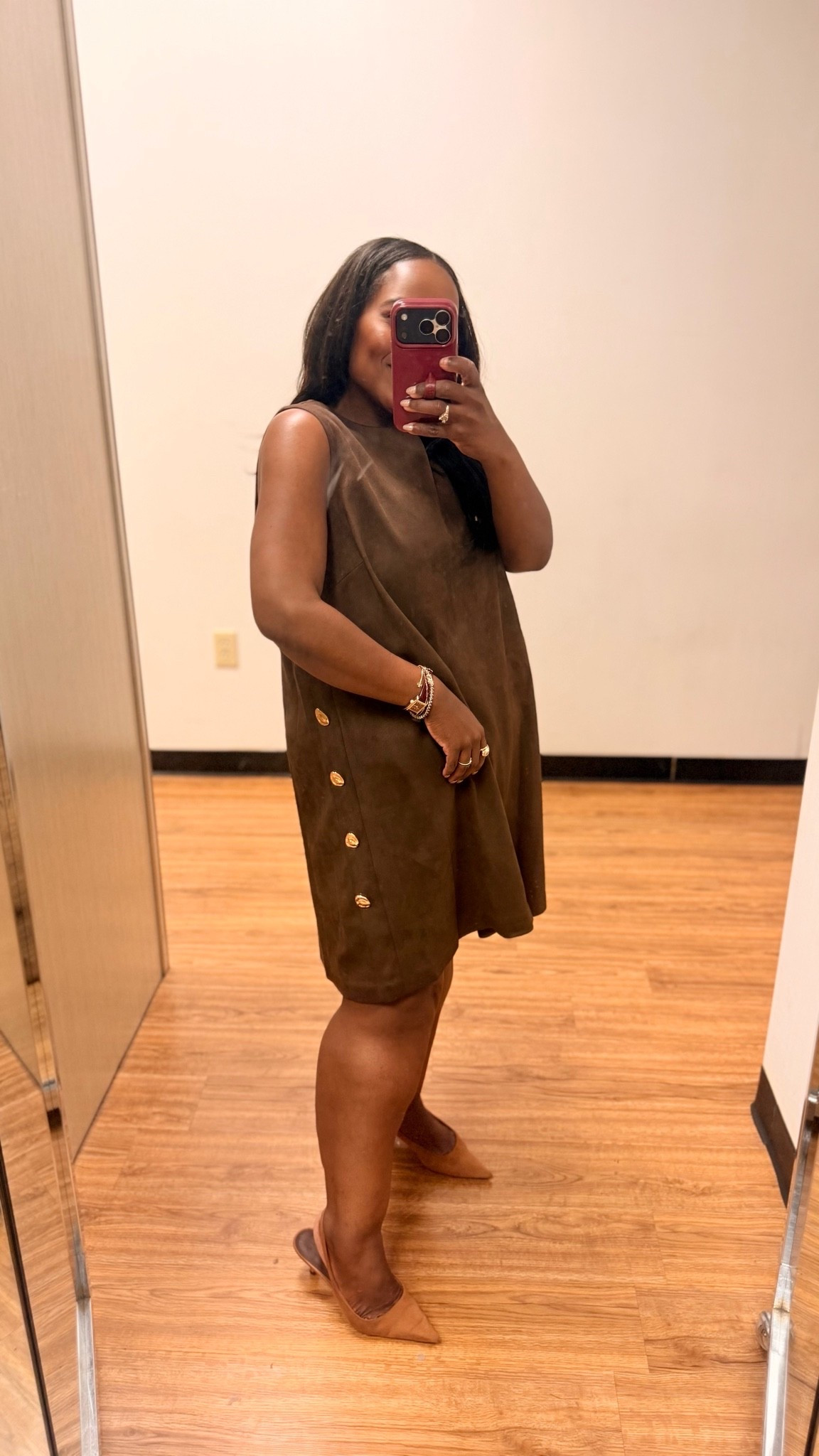Obsessed with this swing suede dress from @Belk !! Love the gold buttons on each side of the dress!! I’m wearing the large here in this photo but I purchased the medium. 🤎

#LTKSaleAlert #LTKPetite #LTKWorkwear