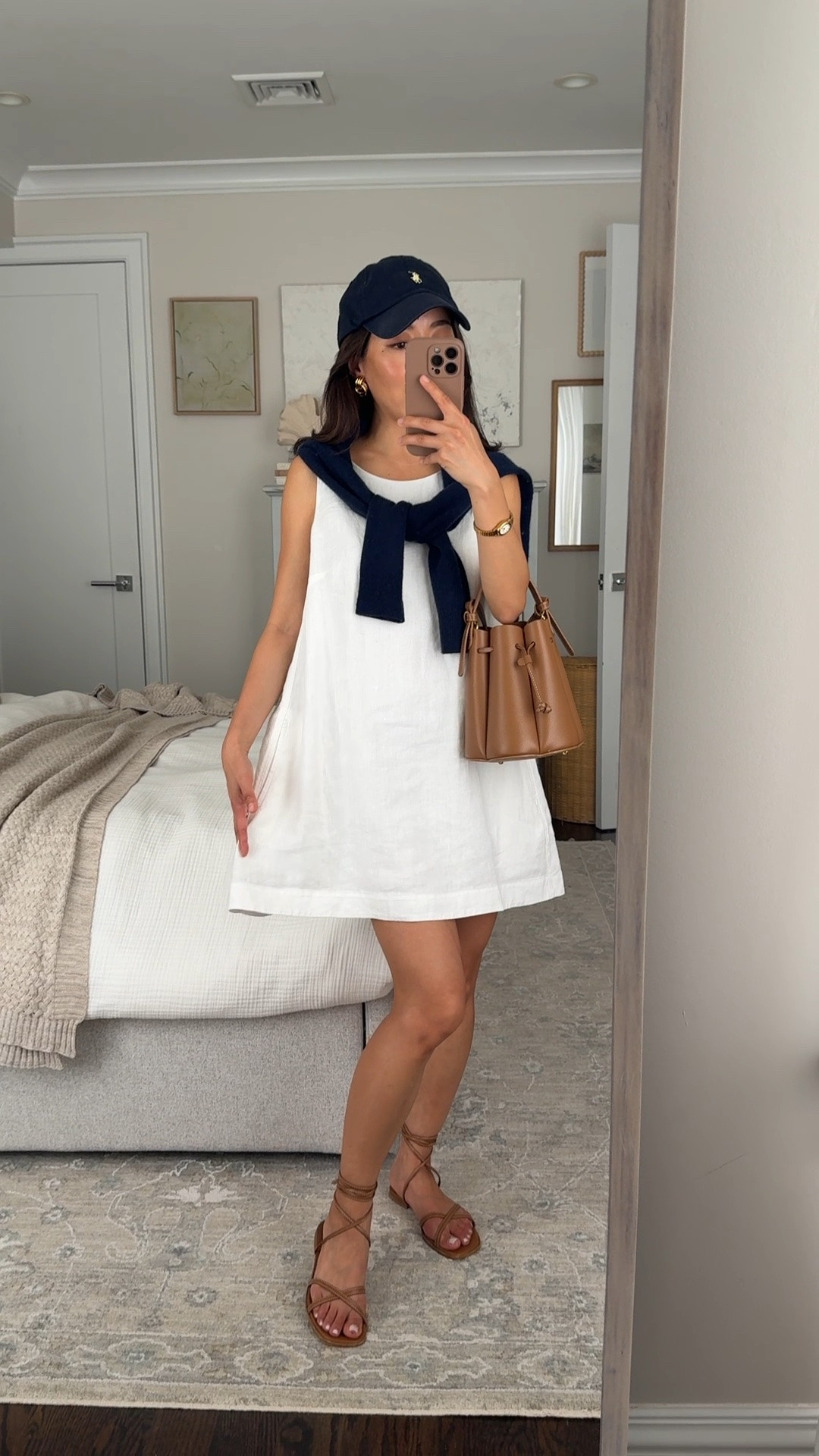 Sizing info below! A favorite for hot weather 
• Athleta linen dress xs petite, generous wide fit on me so size down if you can, 100% linen with lining
• Quince shrunken fit petite friendly cashmere sweater xs
• Margaux sandals 5 
• Polo hat
• Polene bag, linked similar

A line mini dress, petite friendly summer dress, easy petite linen summer outfit ideas

#LTKPetite #LTKSeasonal #LTKootd