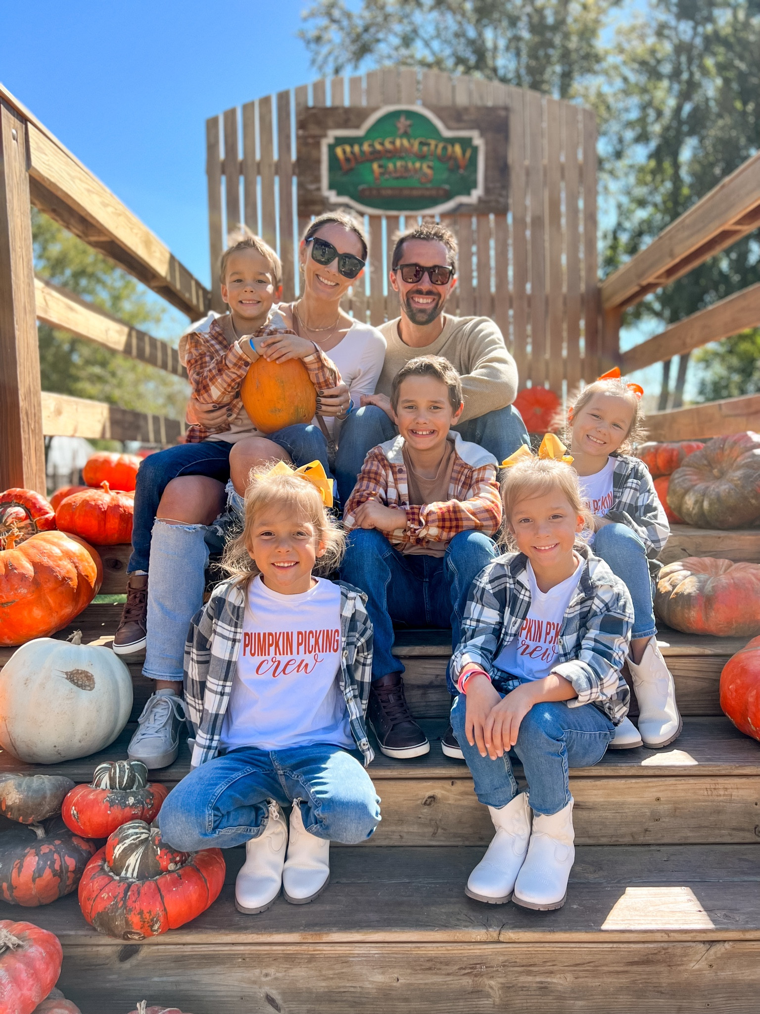 Fall outfit, pumpkin patch, what to wear to the pumpkin patch, fall family photos, pumpkin patch family photos, pumpkin picking crew kids tee, kids plaid shirt, kids plaid shacket, girls white cowgirl boots, boys brown sneakers, coordinating fall outfits for family

#LTKfamily #LTKSeasonal #LTKkids