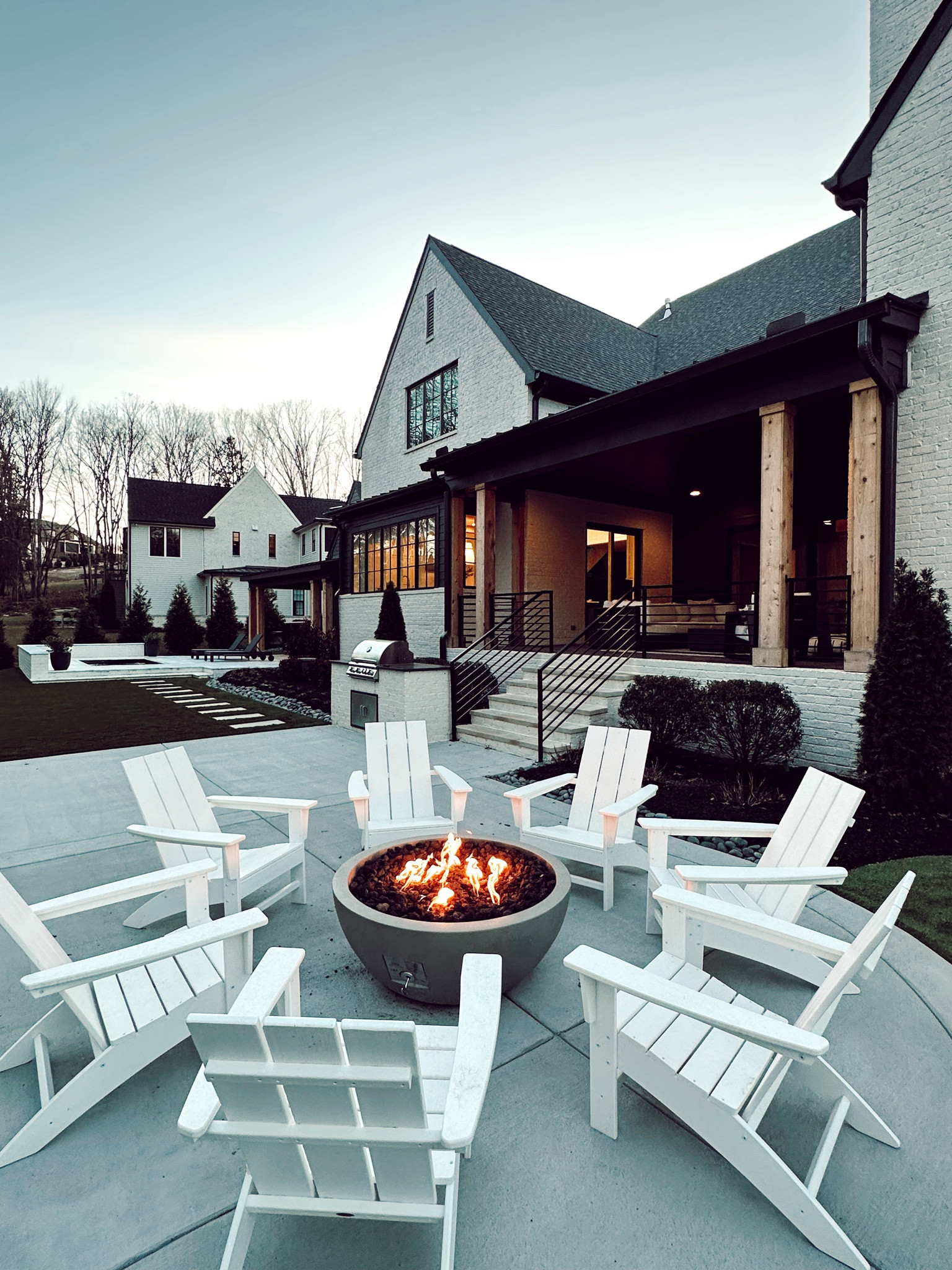 These poly-resin chairs have seen all types of weather and continue to hold up so well. We power wash them once a year—they clean up nicely! On sale now for less than $100 each (a steal!) @walmart #walmartpartner #WalmartHome

#LTKFindsUnder100 #LTKxWalmart #LTKHome