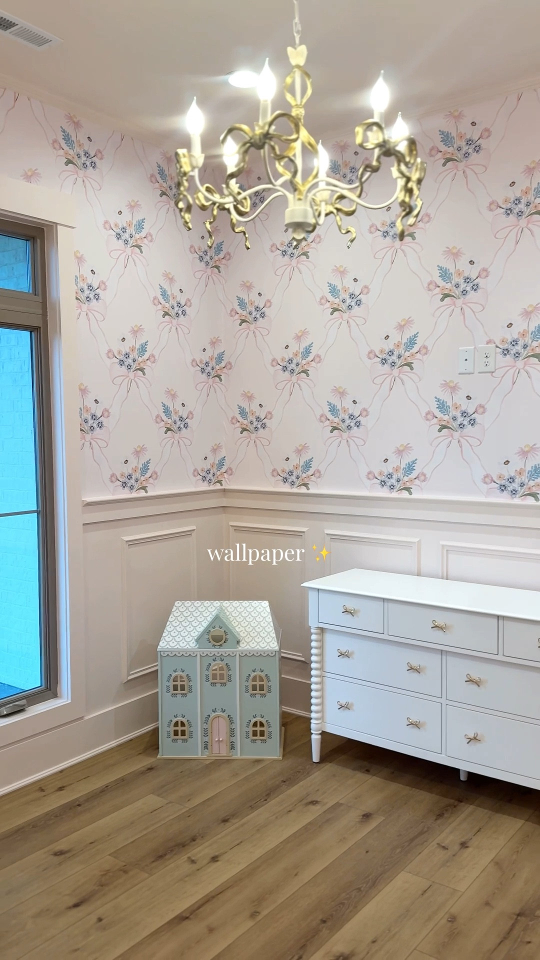 Girls room | toddler girl room | bow wallpaper | bow chandelier | lighting | wallpaper | big girl room | crate and barrel  | crate and kids | pottery barn | pottery barn kids | pottery barn teen | funky paper co | wooden dollhouse | Sherwin Williams intimate white | new build | custom home | new construction | Jenny kind dresser | home decor | interior design | toddler vanity | girls vanity | love shack fancy vanity | girls room decor | coretec floors | Cairo oak | wainscoting | wall panels | bow decor | floral decor | coquette aesthetic | furniture |  @Crate & Barrel | amazon | petite keep | Etsy | mom finds | mom life | stay at home mom 

#LTKHome #LTKBaby #LTKKids