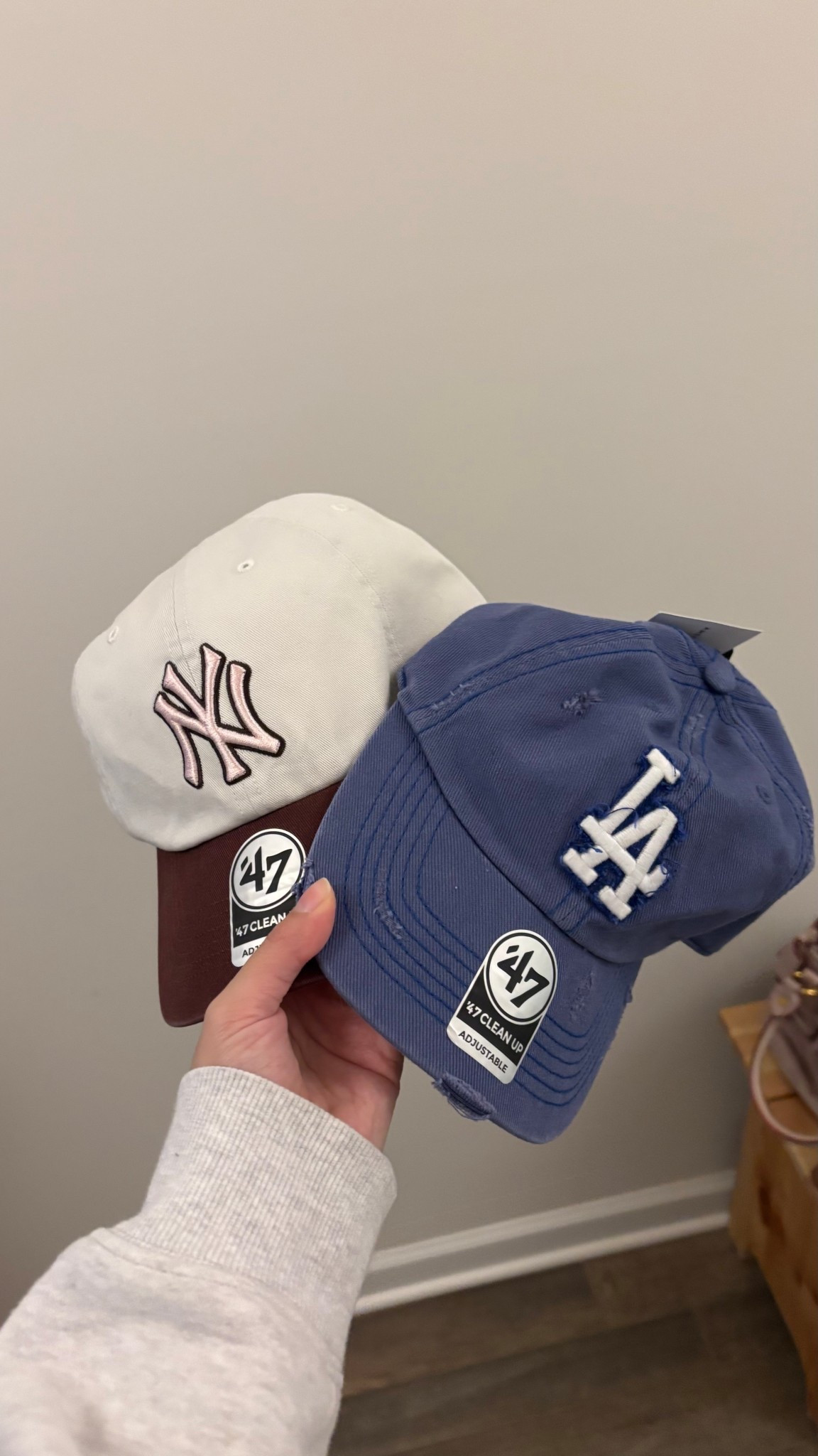 
New York Yankees pink baseball cap
Los Angeles Dodgers distressed baseball cap

#LTKFindsUnder50