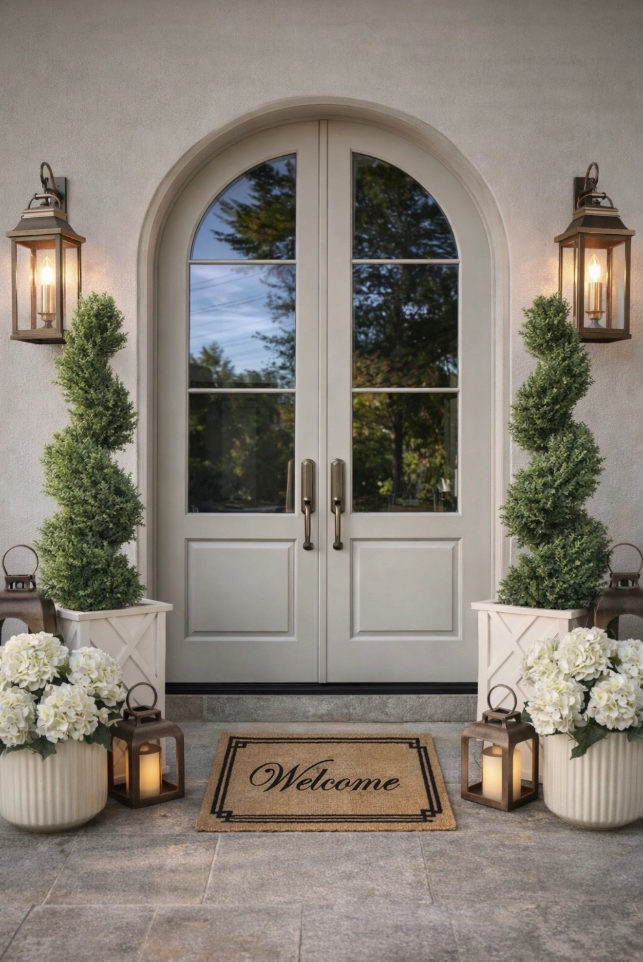Front porch decorations.
French country. Brass outdoor decor. Outdoor planters and topiary. Spring and summer refresh.

#LTKSeasonal #LTKHome