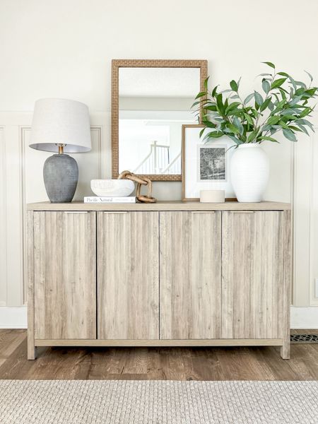 SIDEBOARD ON SALE! Such incredible quality for the price. Ours is sunwashed ash oak. Also comes in two door cabinet.

Sideboard, accent cabinet, home decor, shelf decor, table decor, neutral decor, large vase, faux greenery, wall mirror, lamp, amazon home, Amazon finds, Amazon decor 

#LTKFindsUnder100 #LTKHome #LTKSaleAlert