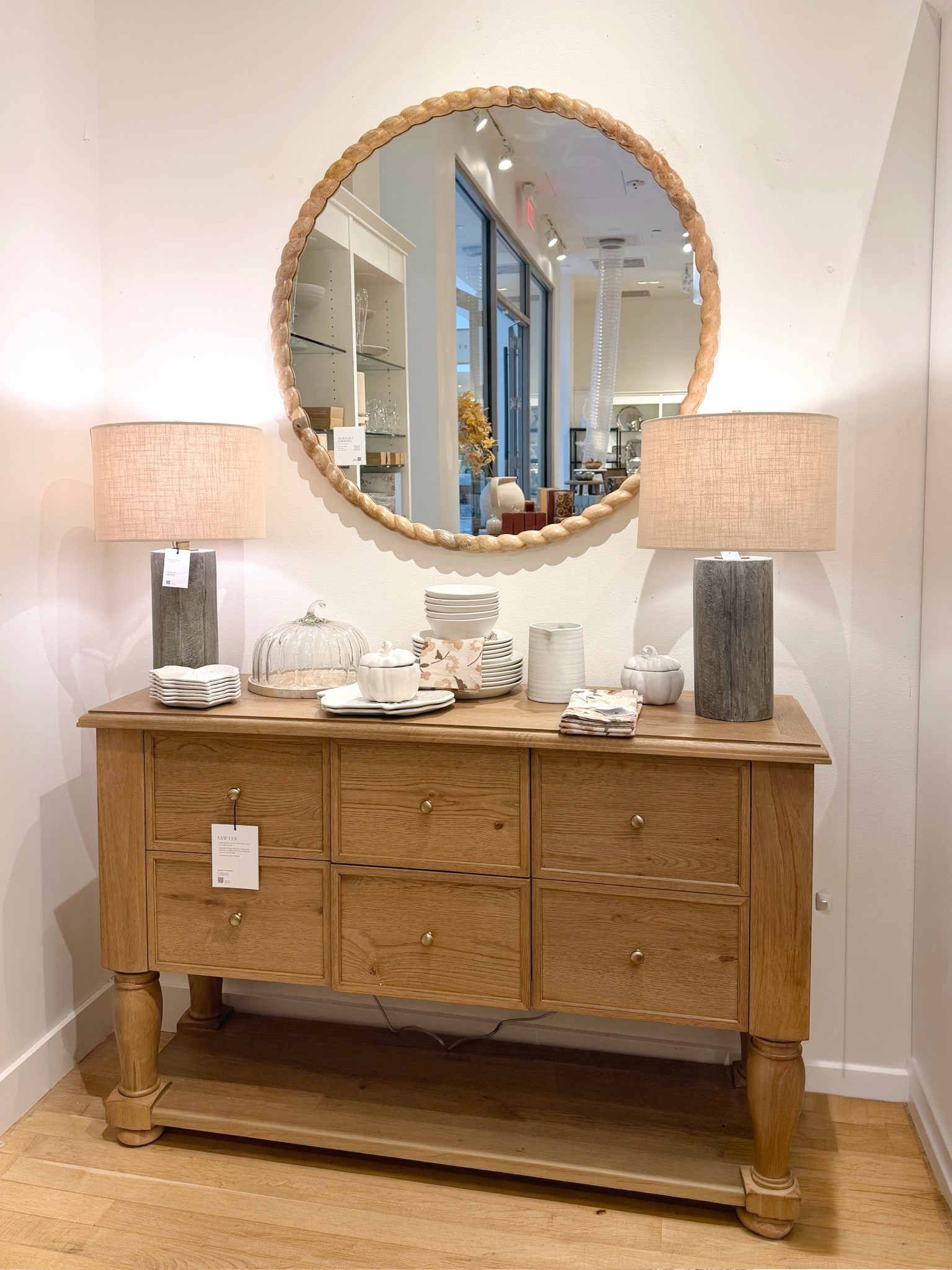 New at Pottery Barn! 😍 The Sawyer Buffet has that beautiful, classic furniture look with rich wood tones, thoughtful craftsmanship, and spacious hidden storage. 🤎 Styled here with matching lamps and a mirror, I love how it creates an elegant console moment while still bringing a touch of relaxed farmhouse charm to the space. I’ve linked it and similar styles in my LTK! ✨ @Pottery Barn #sideboard #buffet #credenza

#LTKHome #LTKSaleAlert
