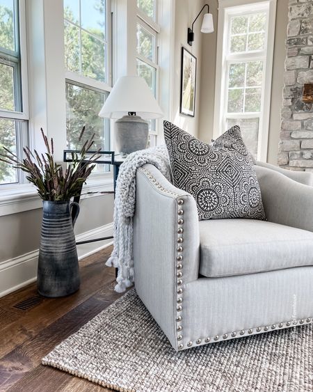Living room furniture, sunroom furniture, throw pillows, lamps, console tables, sconce lights, art prints, area rugs, floor vases, throw blankets, swivel chairs, accent chairs, home decor, fall decor  

#LTKhome #LTKSeasonal #LTKstyletip