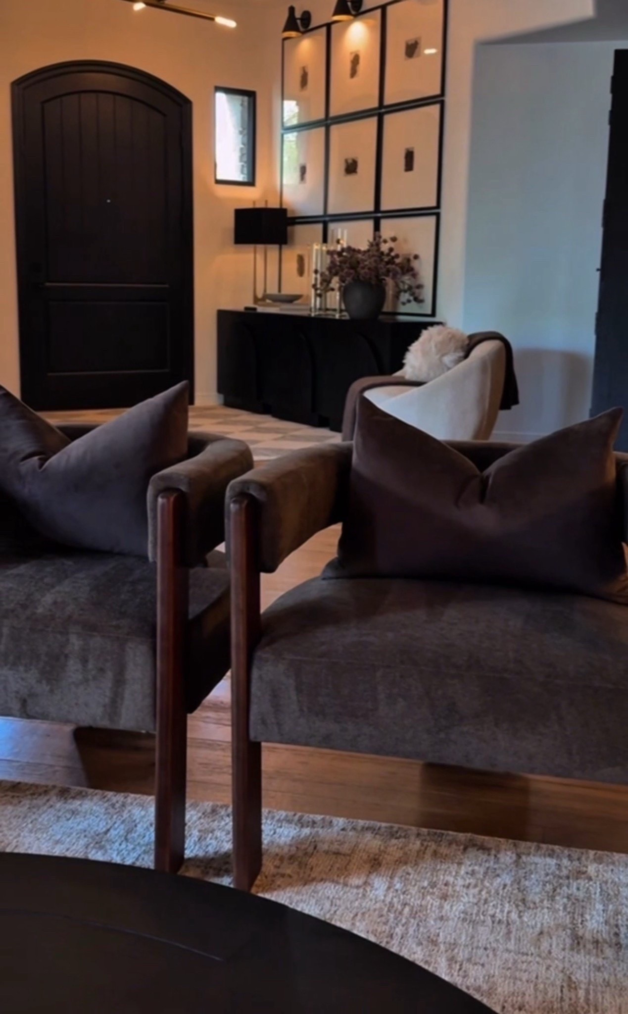 Love how these dark accent chairs ground the whole space cozy but still clean and elevated.

#HomeDesign #NeutralDecor #MoodyHome #CozySpaces #ModernInteriors #HomeInspo #LivingRoomDesign #DecorStyle #InteriorGoals 



#LTKFindsUnder50 #LTKHome #LTKFindsUnder100
