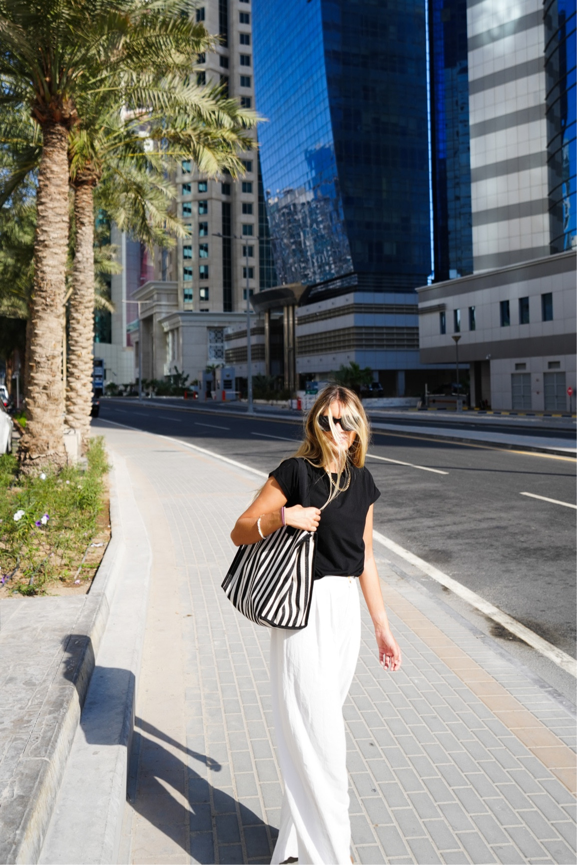 Qatar outfit 🖤🤍 
Linen pants - Shein
Basic black tee (crew neck)
Tote bag - Miniso 
Sunglasses - H&M

#LTKtravel #LTKfit #LTKSeasonal