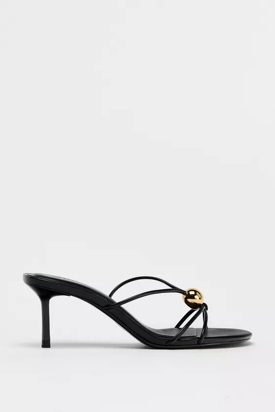 Strappy sandals with straps at the front. Metal appliqué detail. Stiletto heel. Heel height: 7.5... | Zara UK