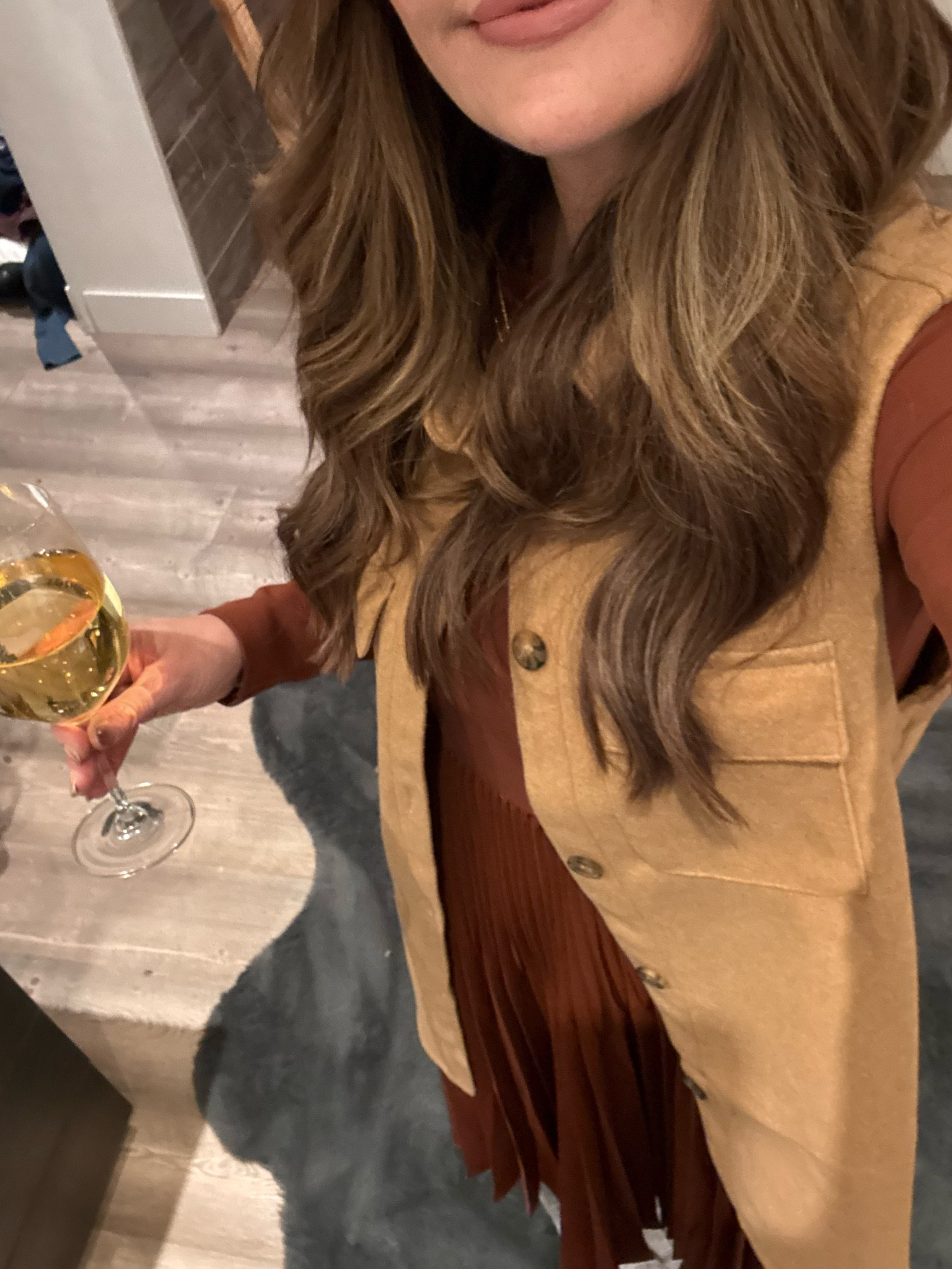 size small in my dress, true to size. my vest is old however I linkes a similar option! 