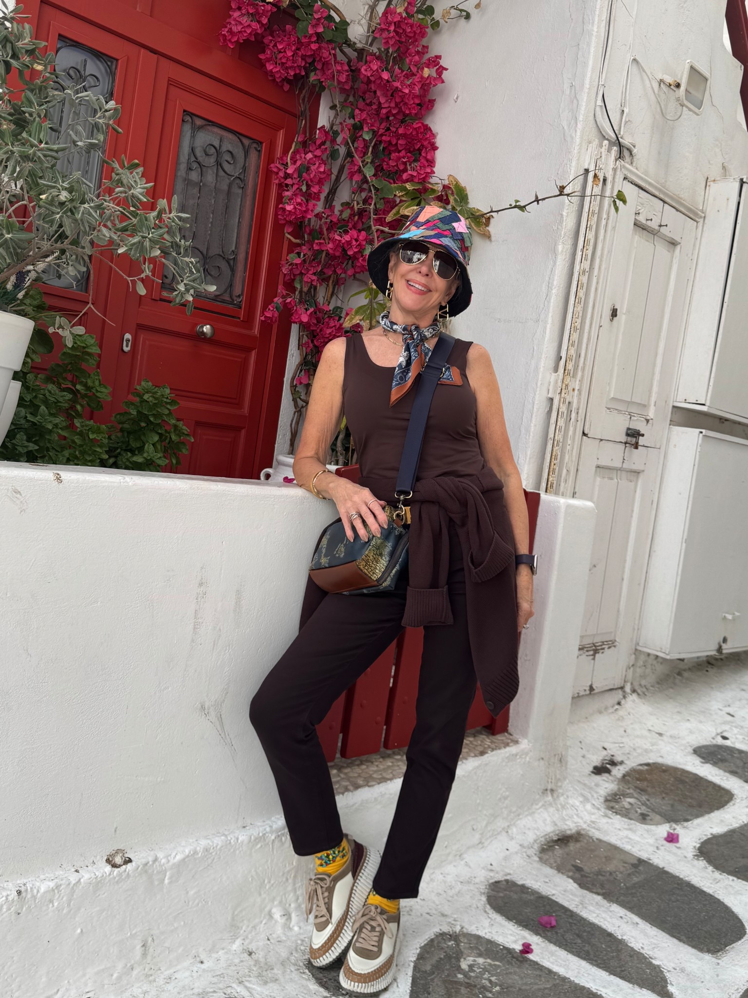 V-neck crop cardigan 
Brown girlfriend slim jeans 
Chloe Nama sneakers. 
Bucket hat, neck scarf

#LTKStyleTip #LTKOver40 #LTKSaleAlert