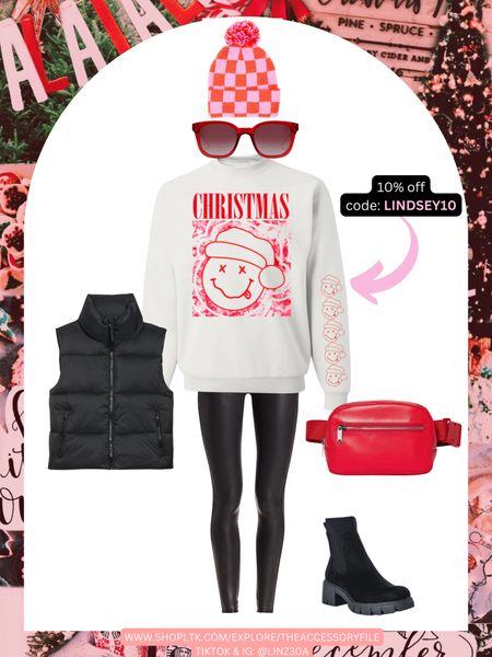 Christmas time outfit idea
⭐️⭐️⭐️use LINDSEY10 on the sweatshirt & anything else on the UM site (partner)⭐️⭐️⭐️

Winter outfit, chelsea boots, black puffer vest, nirvana Christmas sweatshirt, red belt bag, red Fanny pack, crossbody bag, chelsea boots, Walmart fashion, old navy style, red sunglasses, sunnies, beanie, faux leather leggings #blushpink #winterlooks #winteroutfits #winterstyle #winterfashion #wintertrends #shacket #jacket #sale #under50 #under100 #under40 #workwear #ootd #bohochic #bohodecor #bohofashion #bohemian #contemporarystyle #modern #bohohome #modernhome #homedecor #amazonfinds #nordstrom #bestofbeauty #beautymusthaves #beautyfavorites #goldjewelry #stackingrings #toryburch #comfystyle #easyfashion #vacationstyle #goldrings #goldnecklaces #fallinspo #lipliner #lipplumper #lipstick #lipgloss #makeup #blazers #primeday #StyleYouCanTrust #giftguide #LTKRefresh #LTKSale #springoutfits #fallfavorites #LTKbacktoschool #fallfashion #vacationdresses #resortfashion #summerfashion #summerstyle #rustichomedecor #liketkit #highheels #Itkhome #Itkgifts #Itkgiftguides #springtops #summertops #Itksalealert #LTKRefresh #fedorahats #bodycondresses #sweaterdresses #bodysuits #miniskirts #midiskirts #longskirts #minidresses #mididresses #shortskirts #shortdresses #maxiskirts #maxidresses #watches #backpacks #camis #croppedcamis #croppedtops #highwaistedshorts #goldjewelry #stackingrings #toryburch #comfystyle #easyfashion #vacationstyle #goldrings #goldnecklaces #fallinspo #lipliner #lipplumper #lipstick #lipgloss #makeup #blazers #highwaistedskirts #momjeans #momshorts #capris #overalls #overallshorts #distressesshorts #distressedjeans #whiteshorts #contemporary #leggings #blackleggings #bralettes #lacebralettes #clutches #crossbodybags #competition #beachbag #halloweendecor #totebag #luggage #carryon #blazers #airpodcase #iphonecase #hairaccessories #fragrance #candles #perfume #jewelry #earrings #studearrings #hoopearrings #simplestyle #aestheticstyle #designerdupes #luxurystyle #bohofall #strawbags #strawhats #kitchenfinds #amazonfavorites #bohodecor #aesthetics 

#LTKstyletip #LTKHoliday #LTKunder100