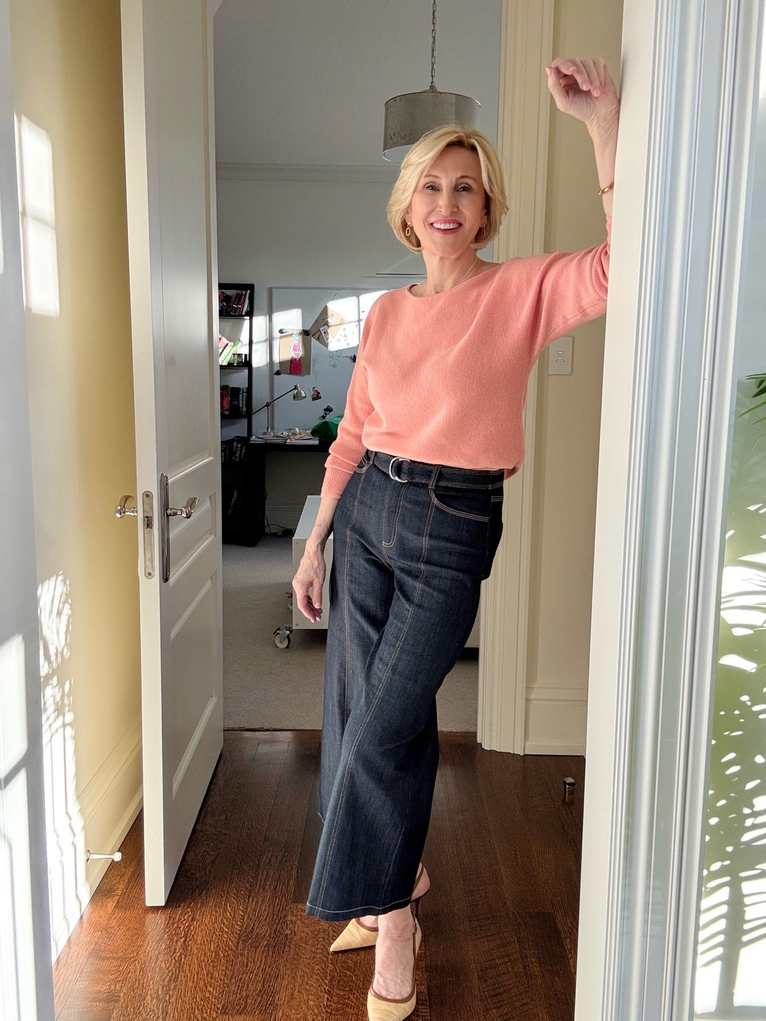 I’ve reached the stage in life where I want my outfits to feel equal parts comfortable and polished… and this one does exactly that ✨ A lightweight peach sweater, high-waisted cropped flare jeans, and slingbacks is the kind of look that makes me feel put together without trying too hard.

And can we talk about how flattering a good pair of high-waisted jeans can be? Sometimes finding denim that feels modern without being overly trendy is a challenge, especially over 50. But a cropped flare with a feminine shoe always seems to work.

#LTKOver40 #LTKSeasonal #LTKgrwm