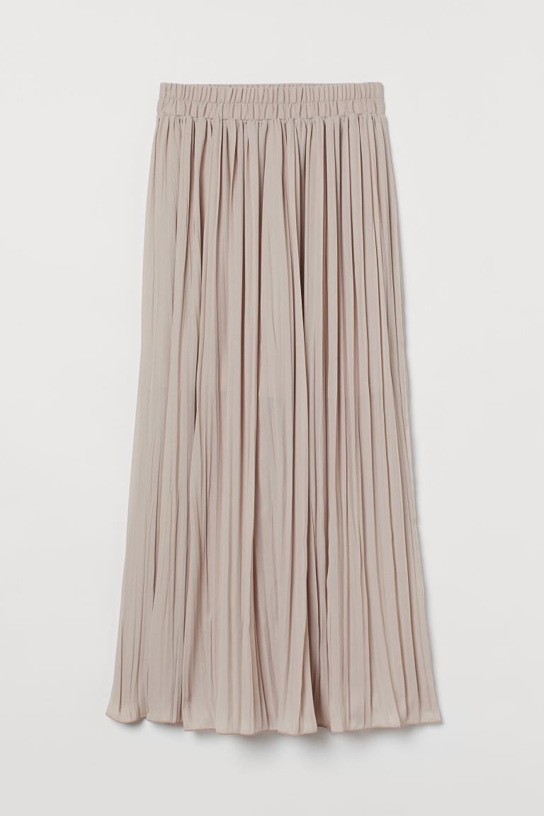Long, pleated skirt in woven fabric with a short liner skirt. Regular waist and waistband with co... | H&M (US)