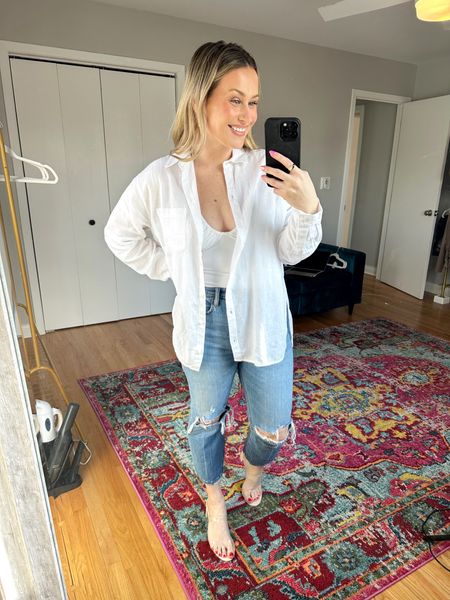 Spring outfit ideas / I love a white linen shirt with denim / this oversized shirt is on sale right now, this cropped top is an amazon fashion find, these mom jeans are on sale and these clear heels are perfect for a vacation outfit 

#LTKshoecrush #LTKsalealert #LTKunder50