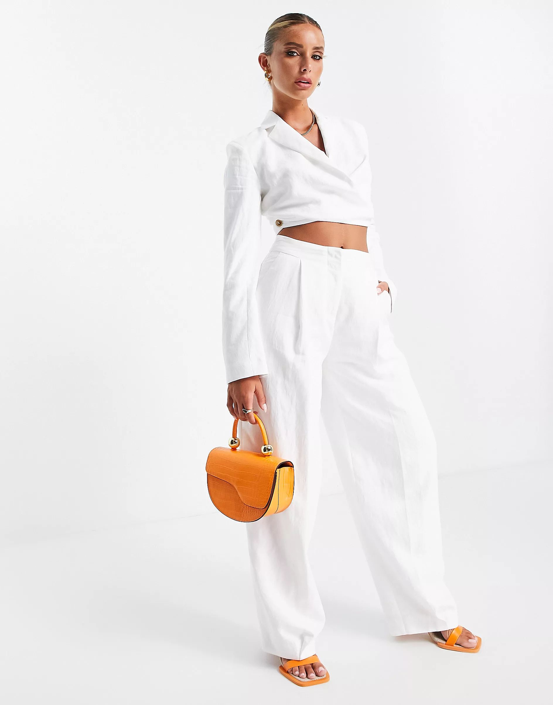 ASOS EDITION pleat front pants in ivory | ASOS (Global)