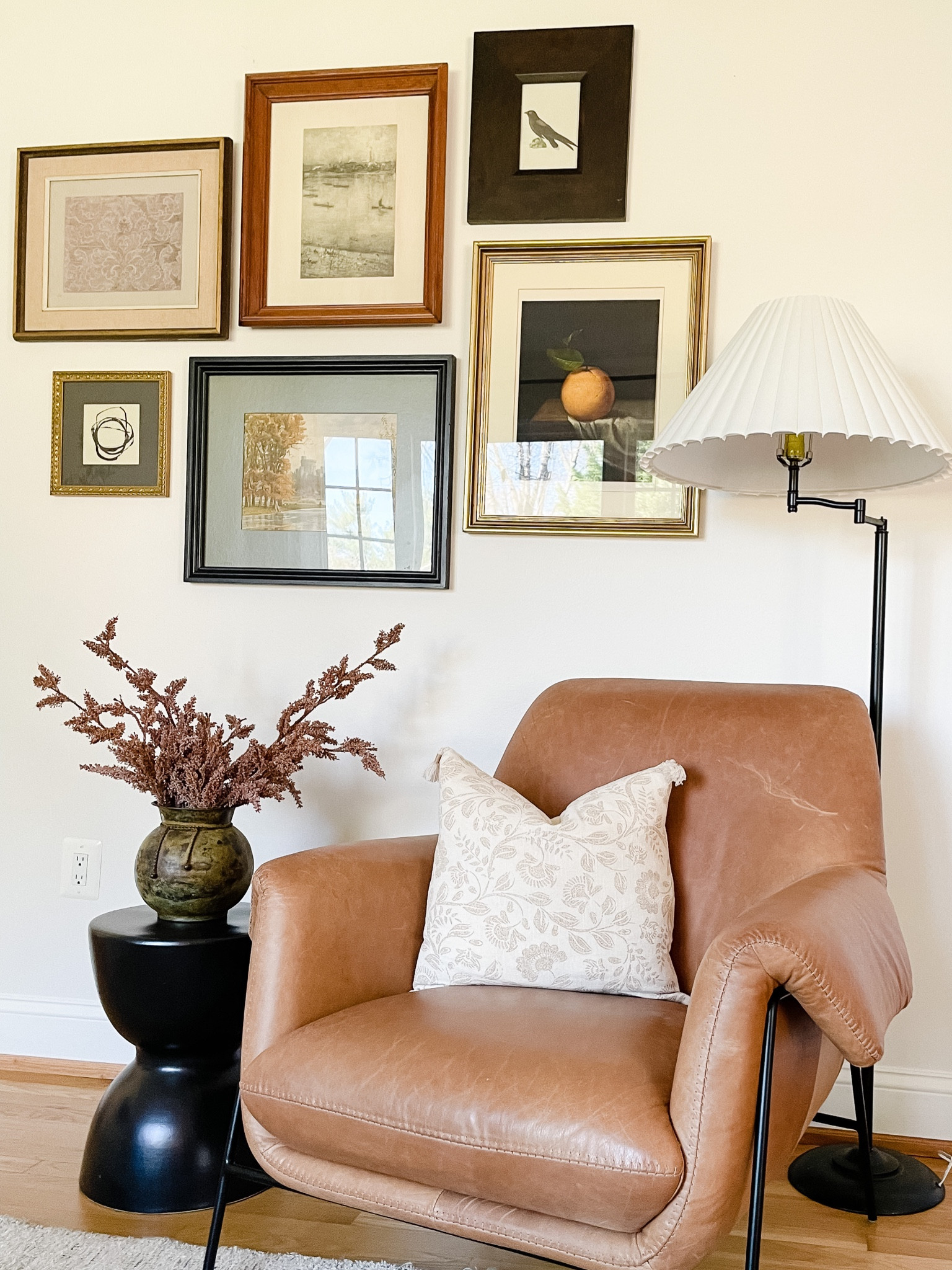 Love the warmth in this little corner! 

Leather accent chair, throw pillow, side table, floor lamp, vintage art, home decor, living room, studio McGee, bedroom, nursery

#LTKhome #LTKstyletip #LTKfamily