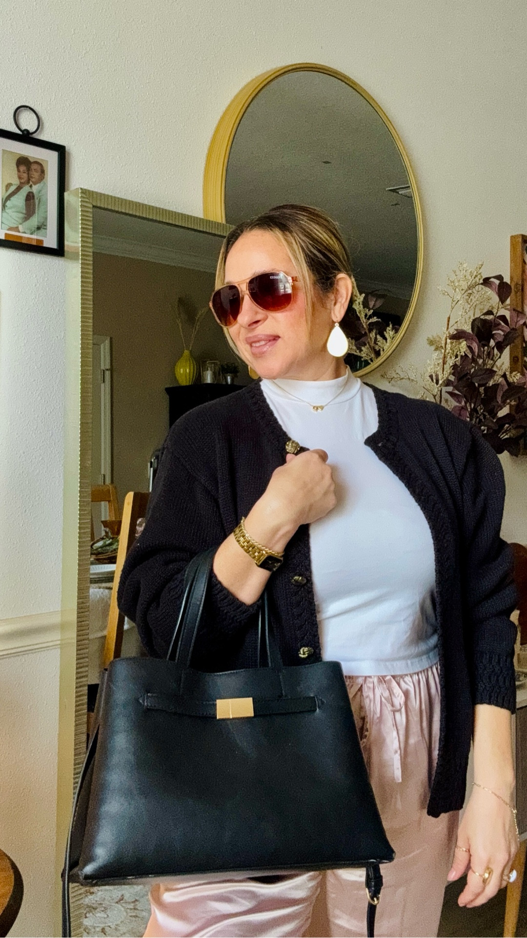 Headed out the door but wanted to show you this chic Amazon look first ✨ This black button-up cardigan is such a classic layering piece, and I paired it with champagne satin pants for an easy fall transition outfit. Added my go-to black tote and quilted slide sandals from Target to pull it all together. Effortless, elevated, and comfortable  perfect for women over 40 who want chic style without the fuss.