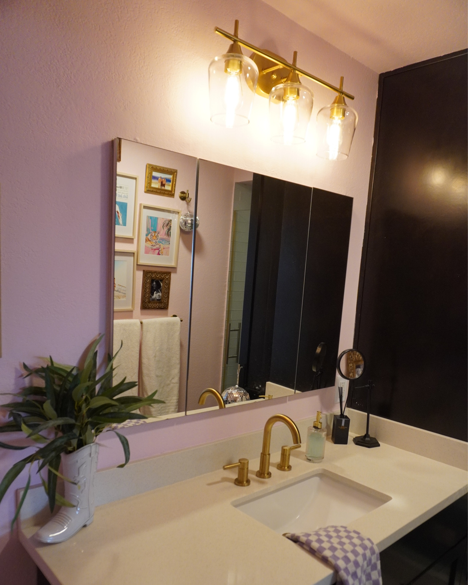 Nursery Guest Bathroom 🚿 🌷☁️ I wanted this bathroom to be functional, cute, and sassy. I curated a fun gallery wall full of fun sassy prints, and DIY the paint. Had a lot of fun with this bathroom 🪩 life is too short for boring bathrooms #nursery #nurserybathroom 

#LTKHome #LTKStyleTip #LTKBaby