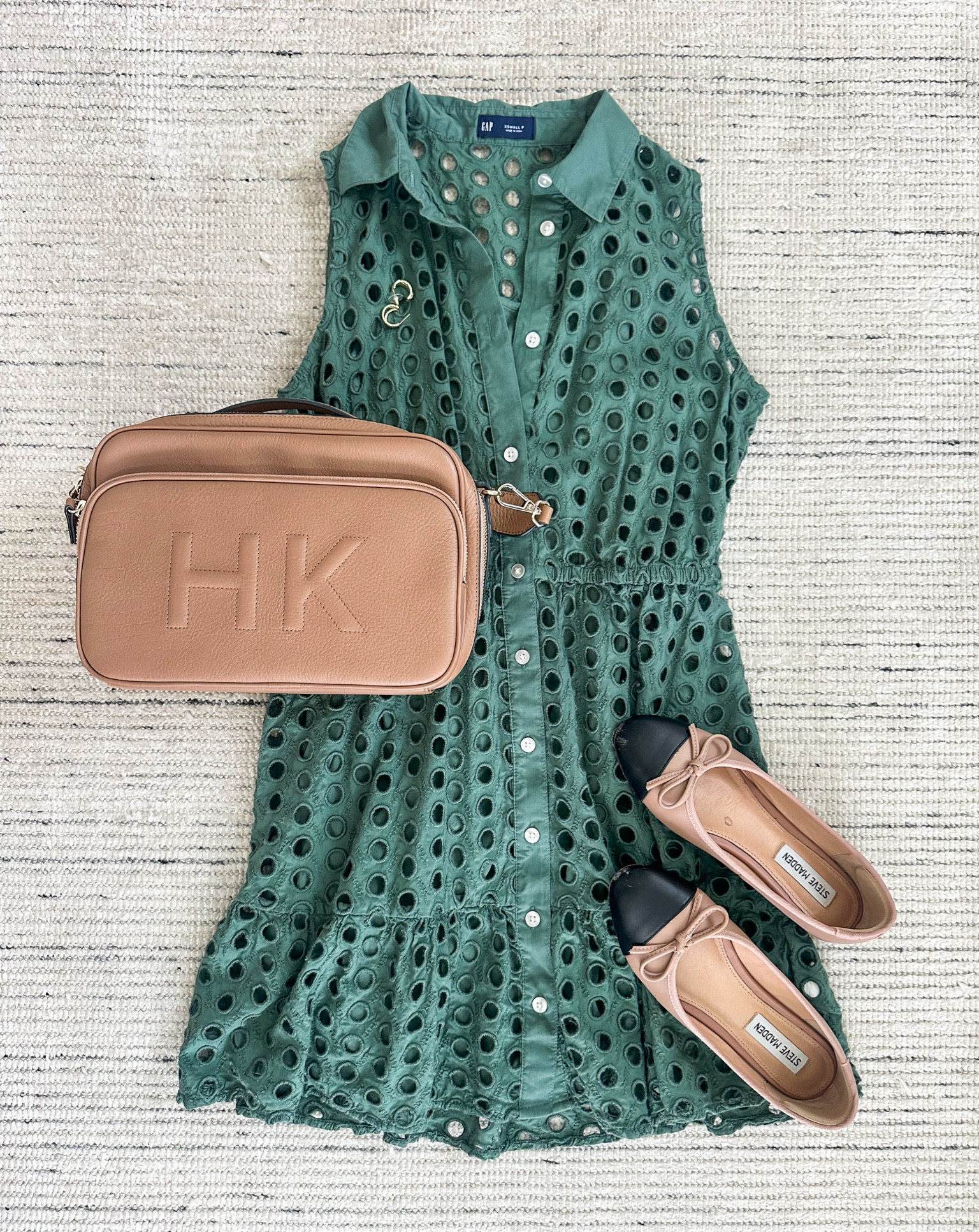 Forest green eyelet tiered dress paired with flats and accessories for a chic look. Love this dress for casual every day, workwear or date nights. On sale for 20% off! 

#LTKSeasonal #LTKStyleTip #LTKSaleAlert