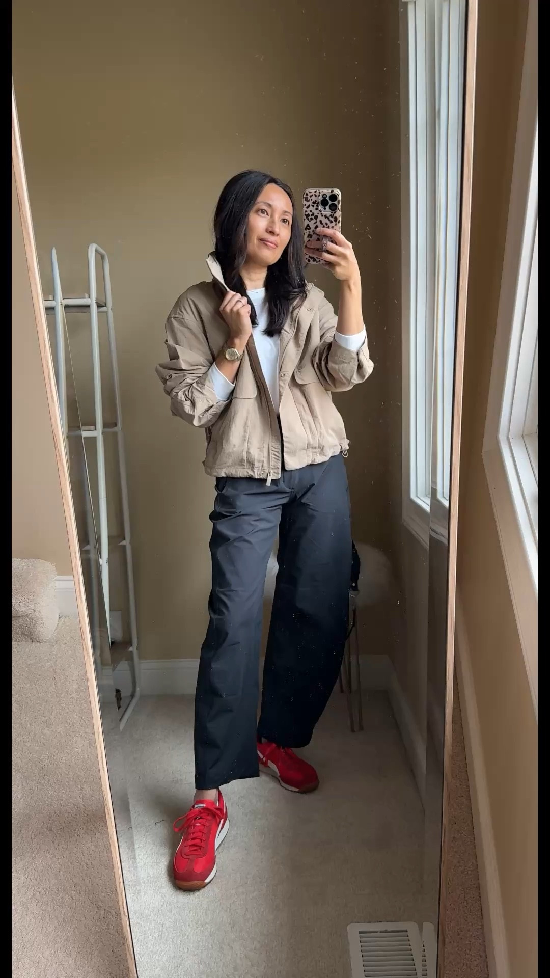 Spring outfit. Travel outfit  Easy, weekend athleisure outfit. 
- Comfy white long sleeve t-shirt: exact t-shirt true to size. 
- Barrel leg athleisure pants: exact pants size down. 
- Funnel neck jacket: exact is an updated athleisure style with good details and hidden hood. I love the adjustable cinchable waist design. Good Spring jacket. Also linking a lower priced option that looks very similar. 
- Pop of color sneakers: exact true to size. 
- Sling bag: my go-to athleisure style bag for the last few years. 


#LTKTravel #LTKOver40 #LTKootd