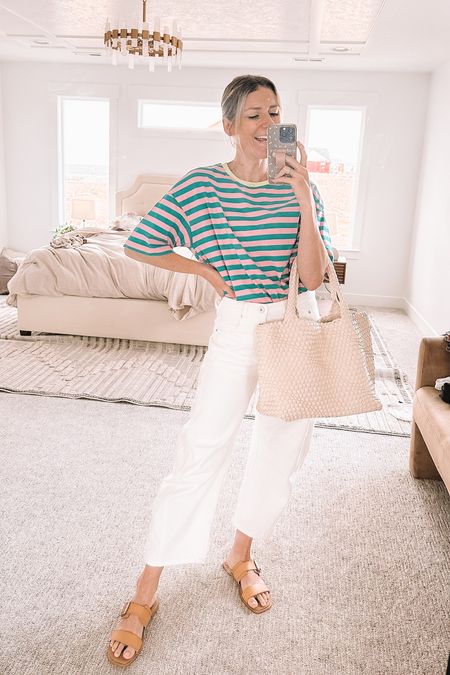 Amazon summer outfit - barrel jeans, large woven purse, sandals and a vibrant, colorful striped tee!

#LTKshoecrush #LTKfindsunder50 #LTKstyletip