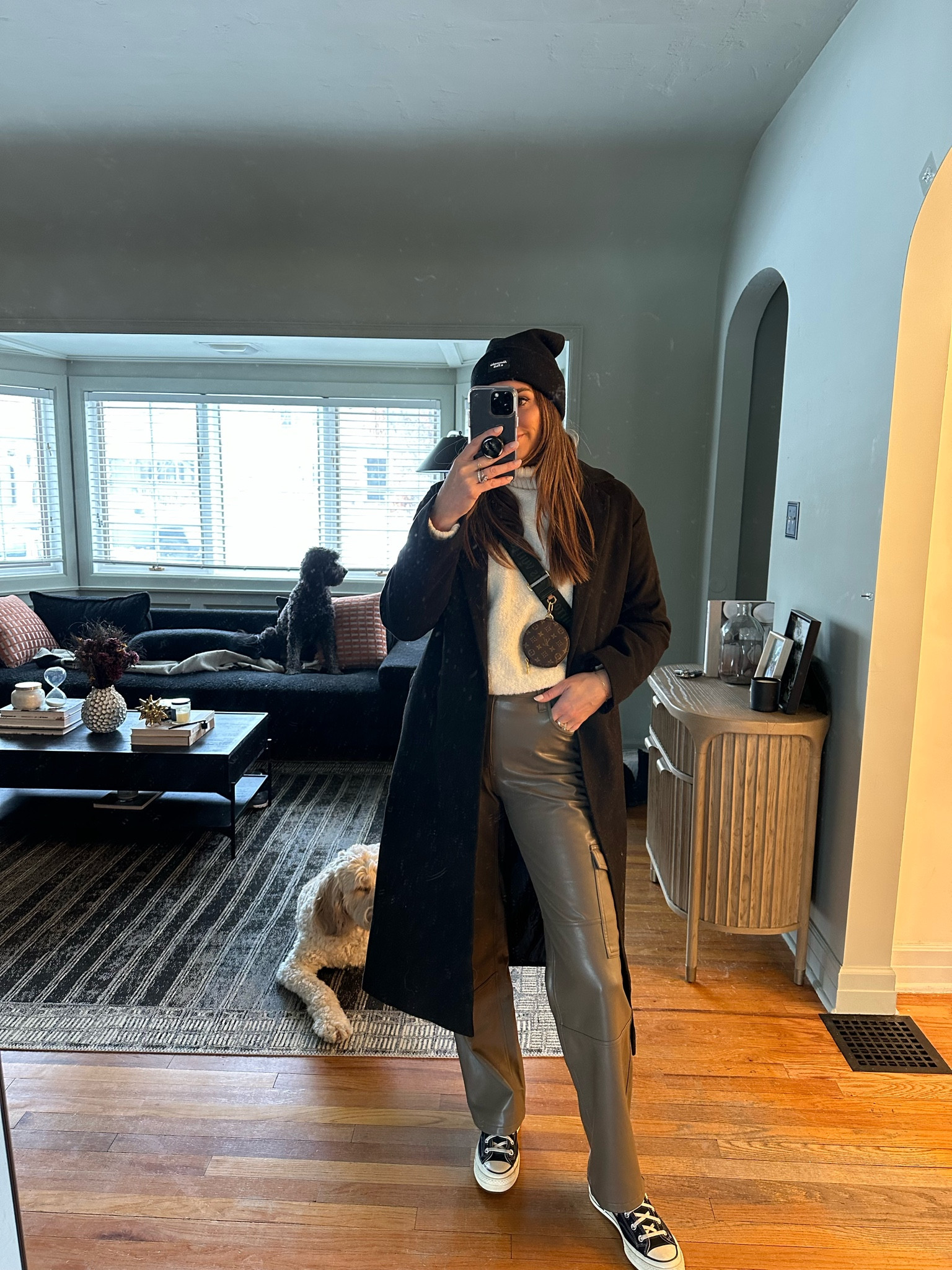 Daytime elevated casual look. Faux leather cargo pants (sized up 1); black oversized long coat; converse sneakers (size down 1/2 size)  

#competition

#LTKsalealert #LTKstyletip #LTKunder50