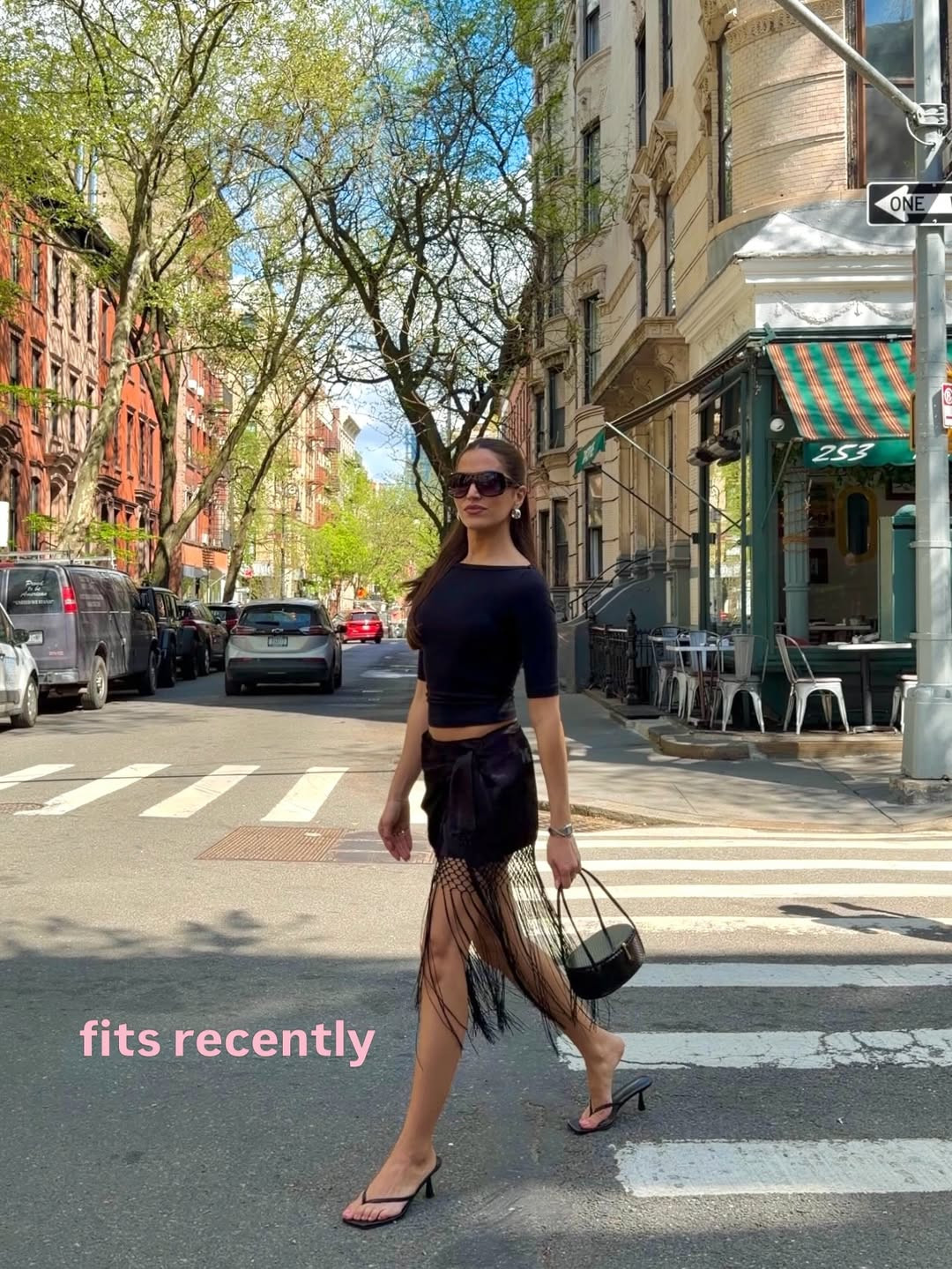 An elevated casual look I’ll be repeating: fitted black top, fringe skirt, mini bag, and barely-there heels. Polished, minimal, and still fun. 🖤 @Zara @Reformation 

summer outfit
black outfit
elevated casual
city style
date night look
fringe skirt
kitten heels
going out outfit

#LTKgrwm #LTKootd #LTKSeasonal