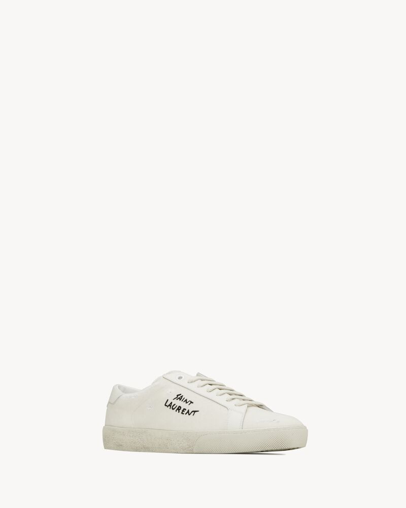 low-profile, distressed sneakers made with organic cotton canvas and leather with stitched saint ... | Saint Laurent Inc. (Global)