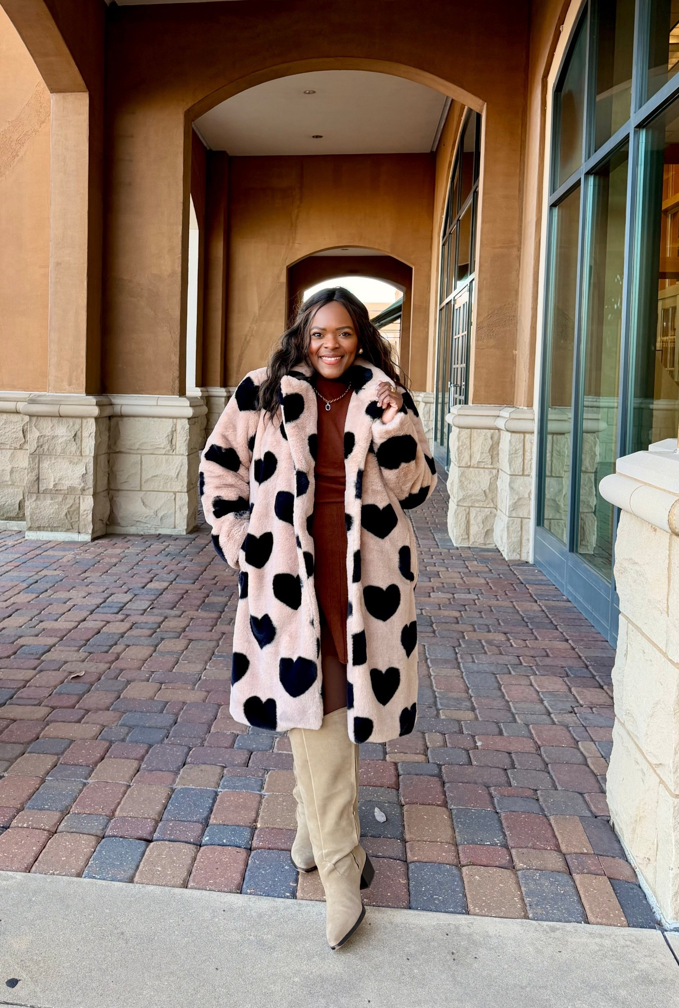 Such a cozy winter outfit and love this faux fur coat with the black hearts from Cato! Wearing a large in coat and in the sweater skirt set from Amazon. 

#LTKootd #LTKMidsize #LTKPlusSize