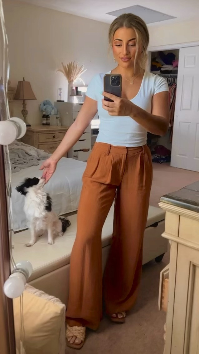 Comfy, breezy, and casual 🤎 wearing a size small in the tee shirt, a size 0 in the pants, and shoes are a size 8. Linked a nearly identical pair of slides from the same brand bc this exact pair is no longer sold.

Side note - is anyone else sick of the slicked back hair? Achieved this volumized look with dry shampoo, light teasing, and a big claw clip 

#LTKFind #LTKunder100 #LTKSeasonal