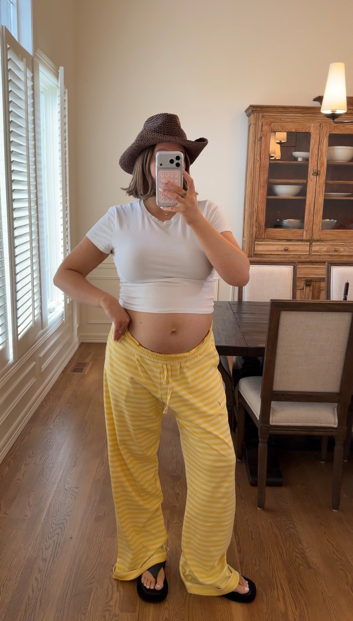 size M/L in daily drills pants I’m 5’ 5” and cuff the pants! Size L Abercrombie tee love these so soft. Target cowboy hat I just bought for a trip this month it’s everything! Flip flops true to size 8 

#loungewear #comfy #stripes #pregnant #cowboyhat #warmweather 