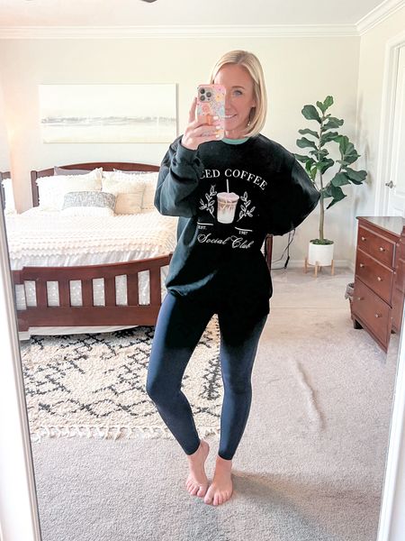 Iced Coffee Social Club Sweatshirt - size medium (I sized up for a roomier fit). So soft and a nice weight (not too heavy). Use code LESLIE15 for sitewide EmmyLou Boutique.
• leggings - size small.

#LTKfindsunder50 #LTKsalealert #LTKSeasonal