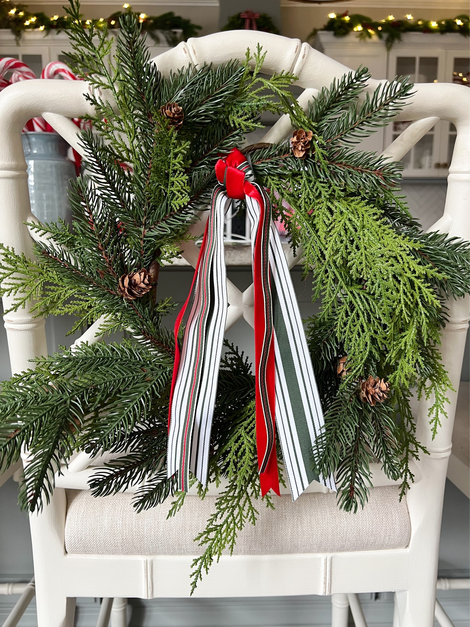 I found a 3-pack of holiday ribbon at Target and decided to keep it simple and use them for my chair wreaths. These exact chair wreaths are from Kirklands (not linkable on LTK) but linking some other great options  

#LTKSeasonal #LTKHoliday
