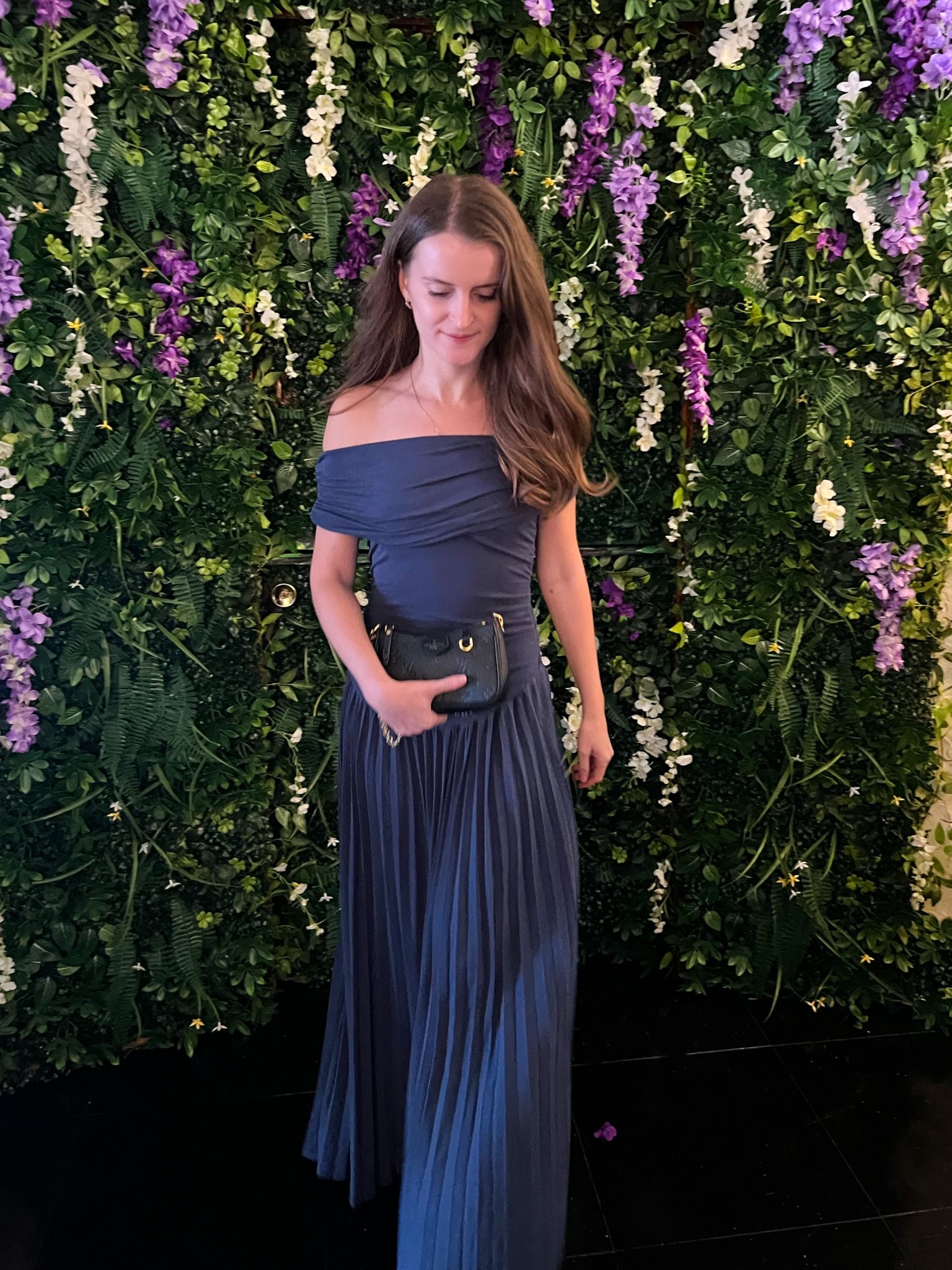 This off the shoulder maxi dress is perfect for a summer wedding guest look, date night, or vacation dinner. I paired it with black heeled sandals, a sleek clutch, and simple jewelry for an effortless but elevated summer outfit.
.
.
.
.
.
#LTKSeasonal #LTKU #LTKSaleAlert #LTKPetite #LTKParties #LTKFindsUnder50 #LTKFindsUnder100 #LTKStyleTip #LTKShoeCrush #LTKItBag #LTKWedding 

Summer dresses | summer outfits | summer wedding guest dress | dress for wedding | long dress | maxi dress | navy dress | vacation dress | date night outfit | date night dress | dinner outfit | dinner dress | sandals 2025 | black sandals | strapping sandals | evening bag | clutch bag | outfit inspo | outfit ideas 