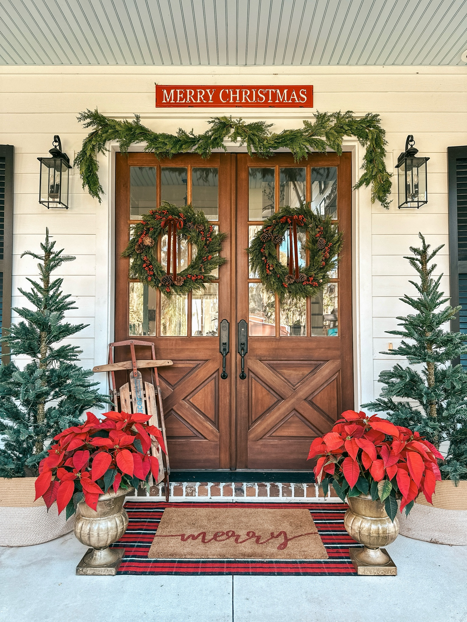 Farmhouse Christmas front porch 

#LTKhome #LTKSeasonal
