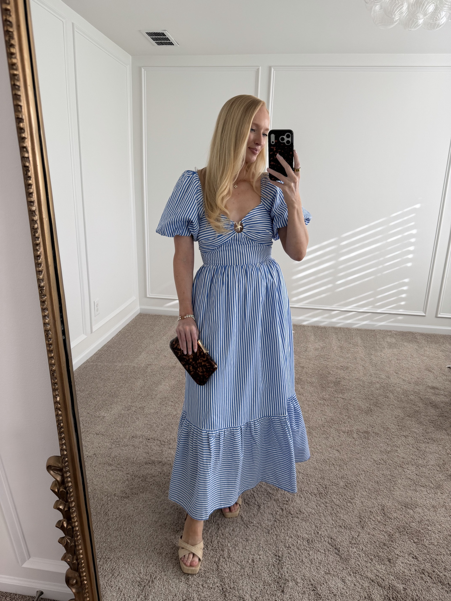 This blue and white stripe maxi dress is too cute if you’re heading somewhere warm! It has a very flattering waist and ties in the back. I can wear it without a bra. 