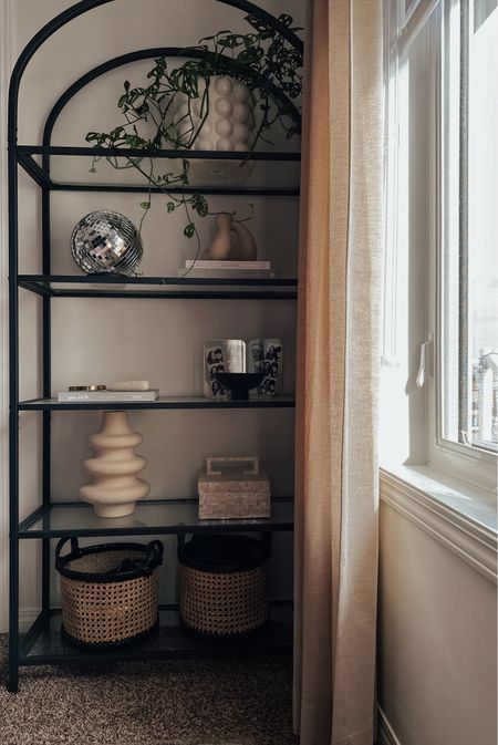 Sharing my affordable arched bookshelf & decor 

#LTKhome #LTKfindsunder50 #LTKfindsunder100