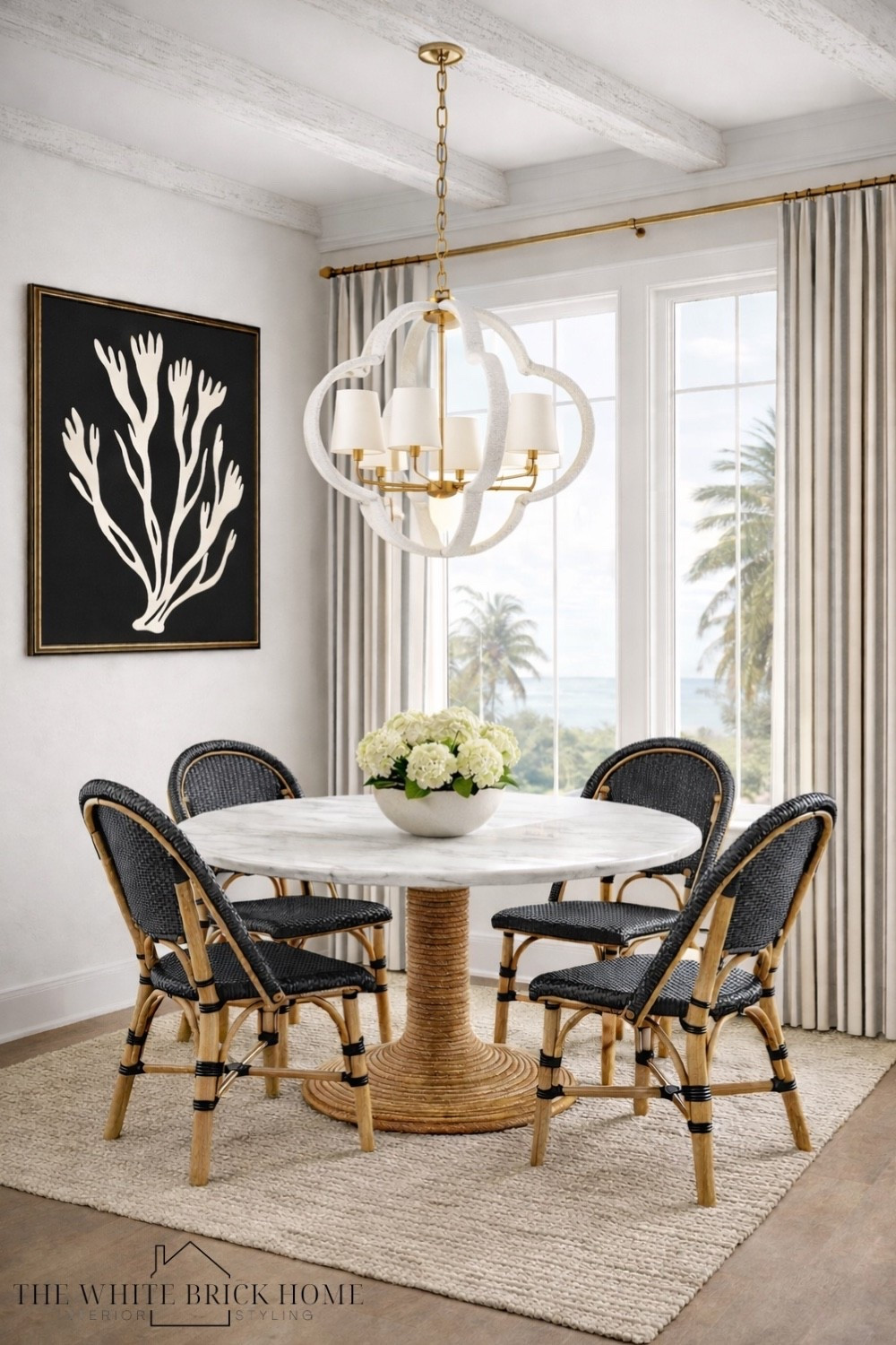 A timeless coastal dining nook that blends elegance and natural texture - with woven rattan and marble creating an elevated room design. 
🖤🖤
Dining room, dining nook, dining furniture, dining room lighting, coastal dining room, dining room chair, rattan chair, Serena and lily, wall art, modern coastal room, coastal dining room, home decor, dining furniture, table, round table 


#LTKSeasonal #LTKHome #LTKSaleAlert