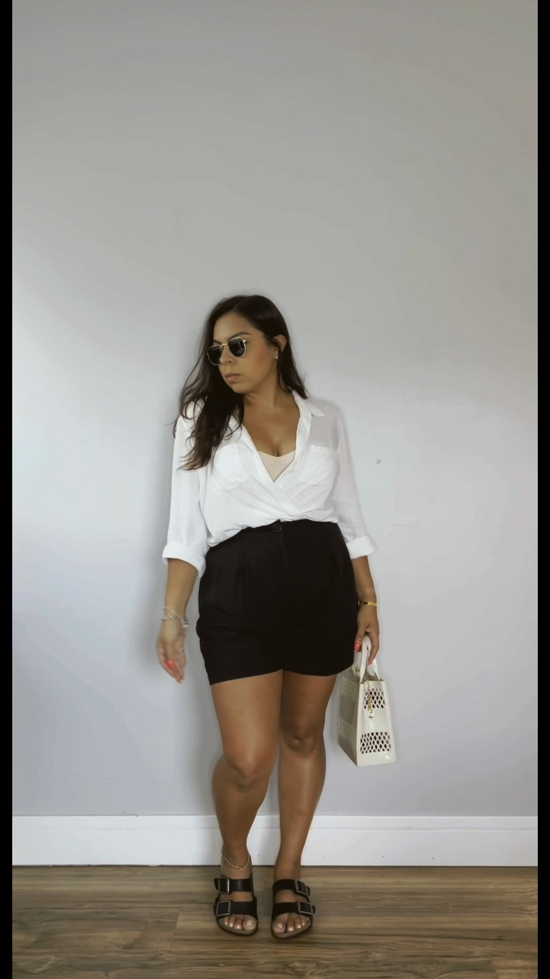 Capsule wardrobe black shorts white button up old money aesthetic casual outfit day date city outfit 

#LTKSeasonal #LTKstyletip #LTKunder100