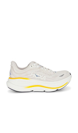 HOKA Bondi 9 Sneaker in White. - size 9.5 | Revolve Clothing (Global)